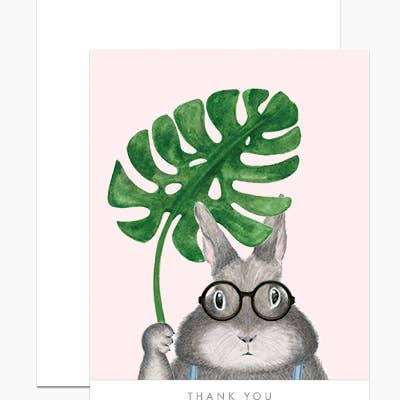 Illustration of a Dear Hancock Bunny with Monstera Card Set of 6 holding a monstera leaf with the words &quot;thank you&quot; at the bottom.