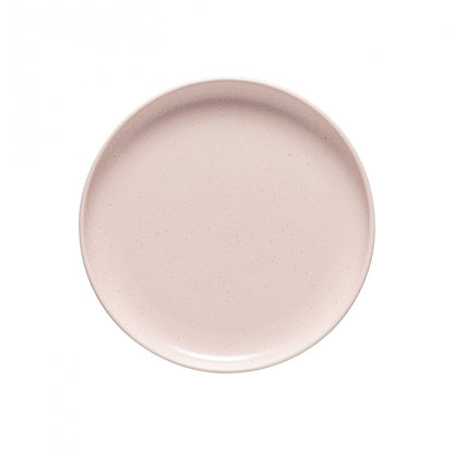 A pink plate with a matte finish on a white background from the Casafina Living Pacifica Marshmallow Dinnerware collection.