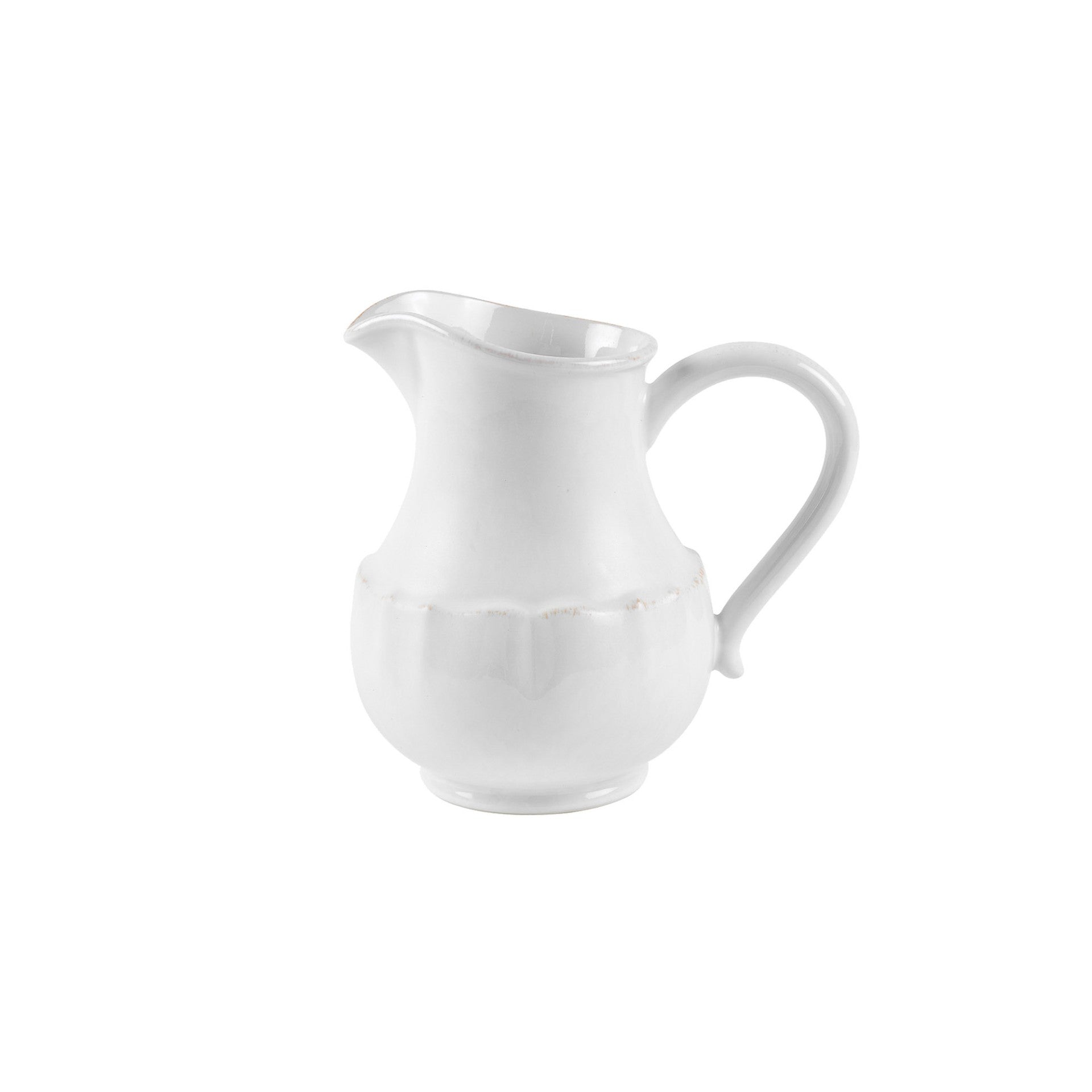 White ceramic pitcher on a white background