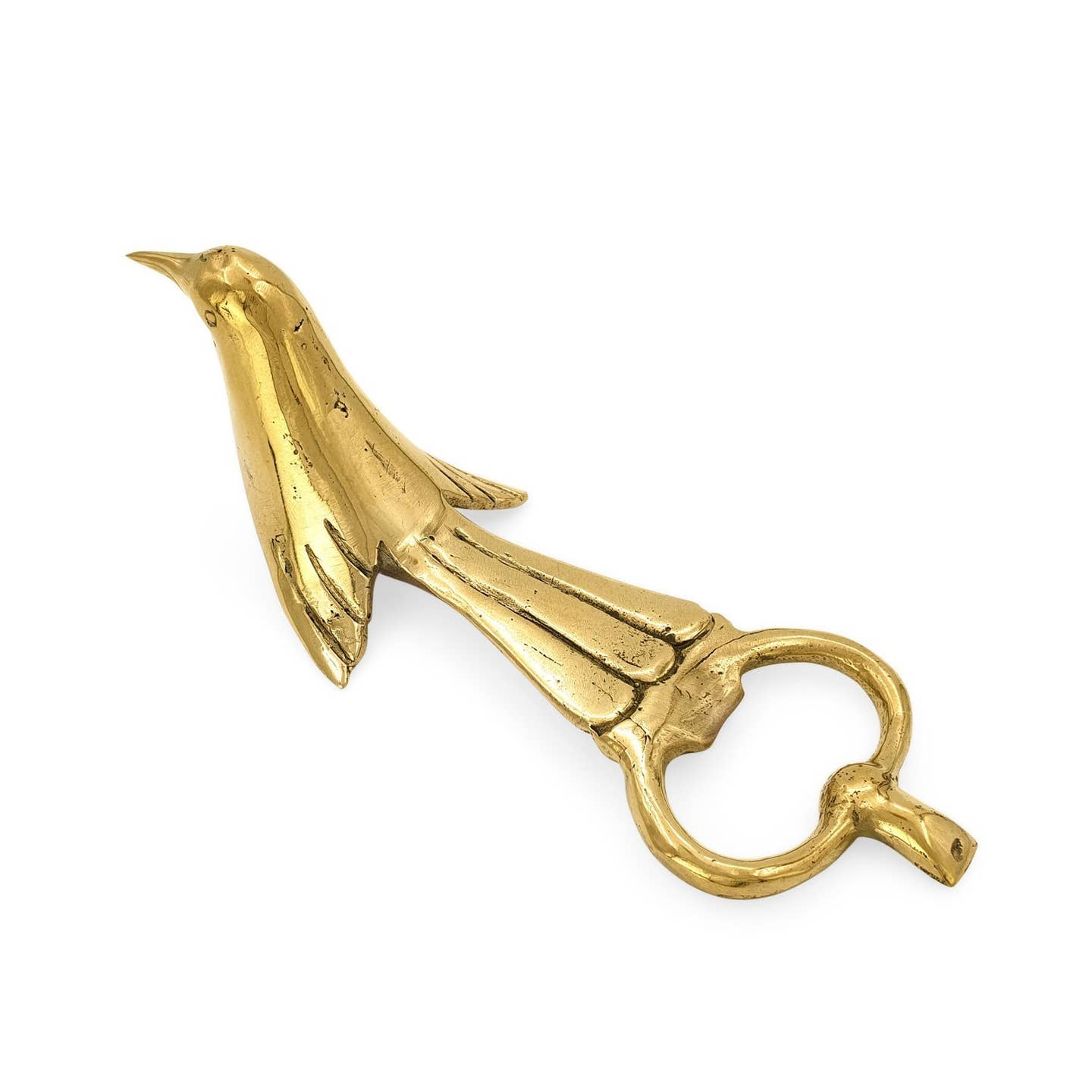 Brass bottle opener in the shape of a bird.