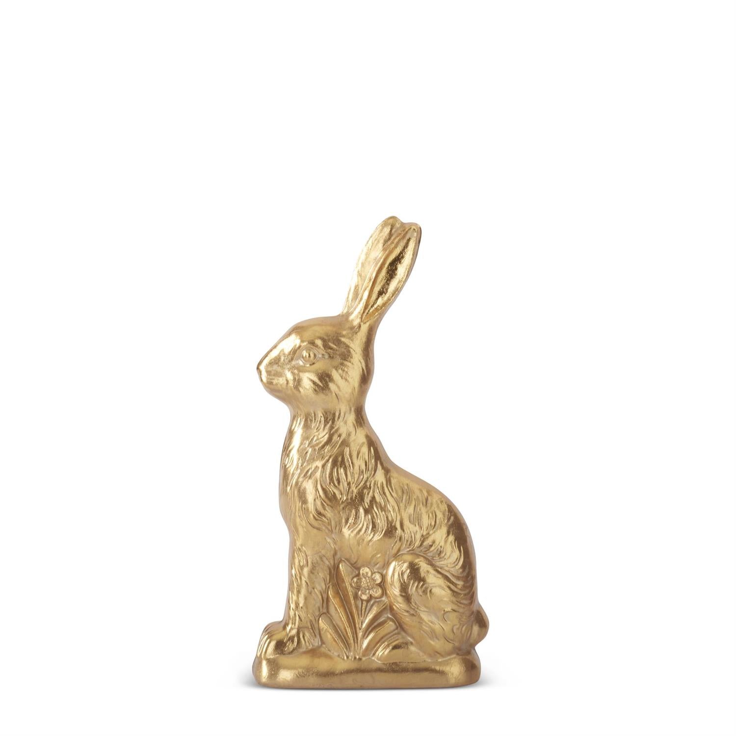 Gold rabbit-shaped pendant on a white background
