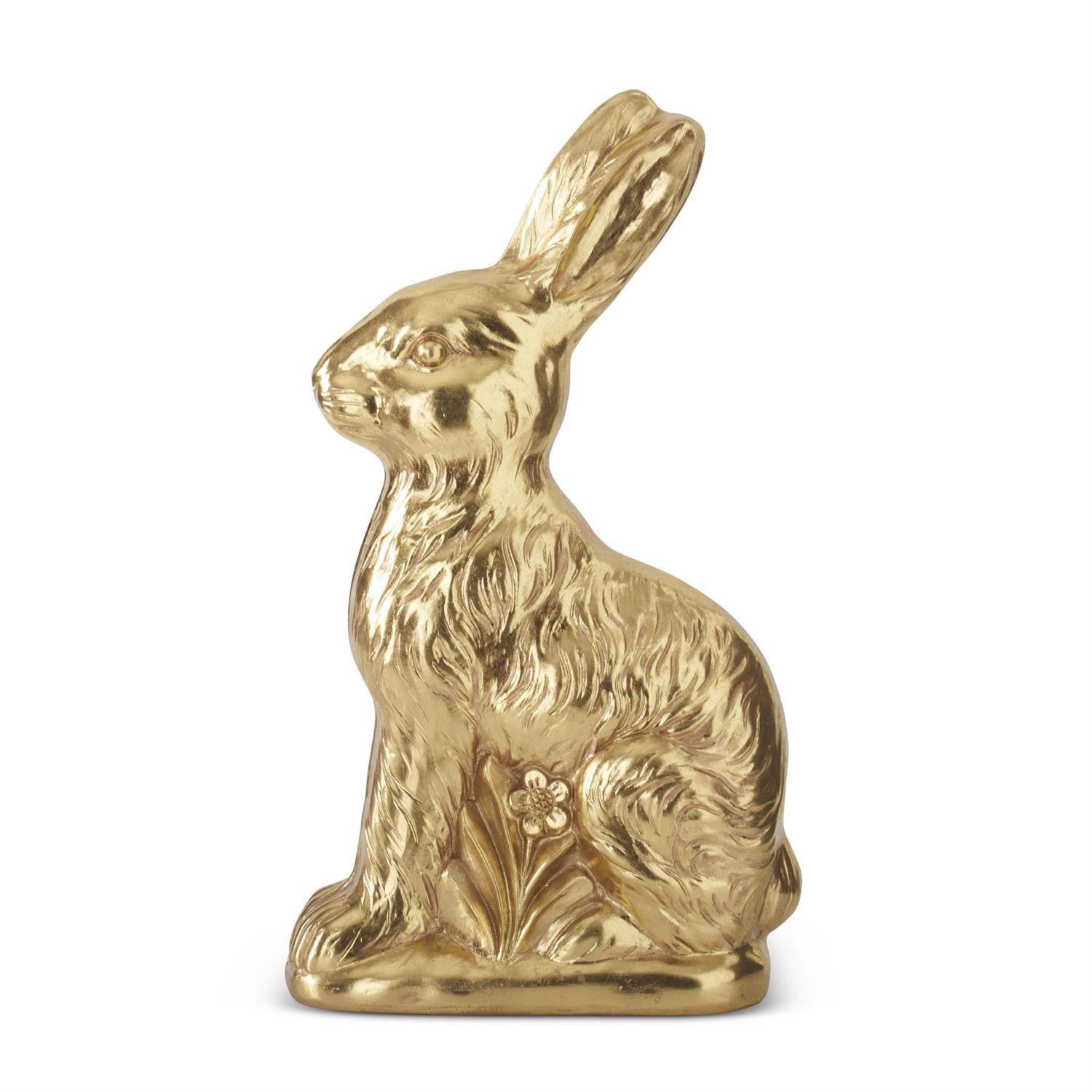 Gold rabbit figurine on a white background
