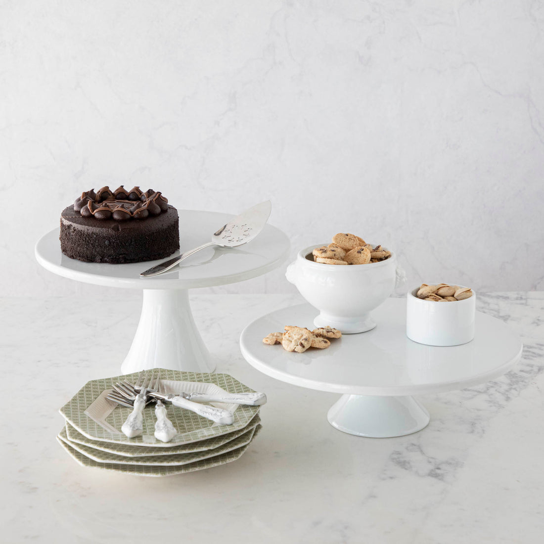 A chocolate cake, cookies, and nuts presented elegantly on BIA&