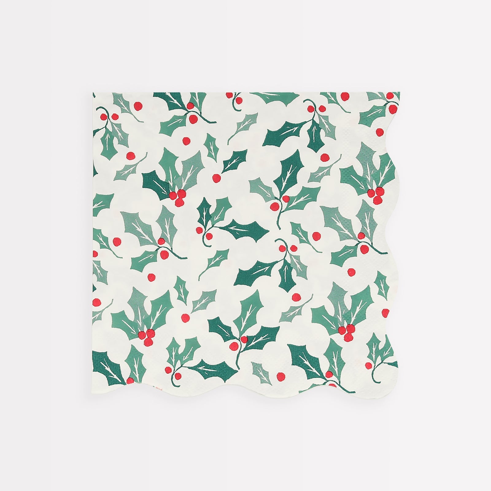 Meri Meri Holly Pattern Large Napkins in a scalloped shape, with a holly design, are the perfect party napkins to add to your Christmas party supplies.