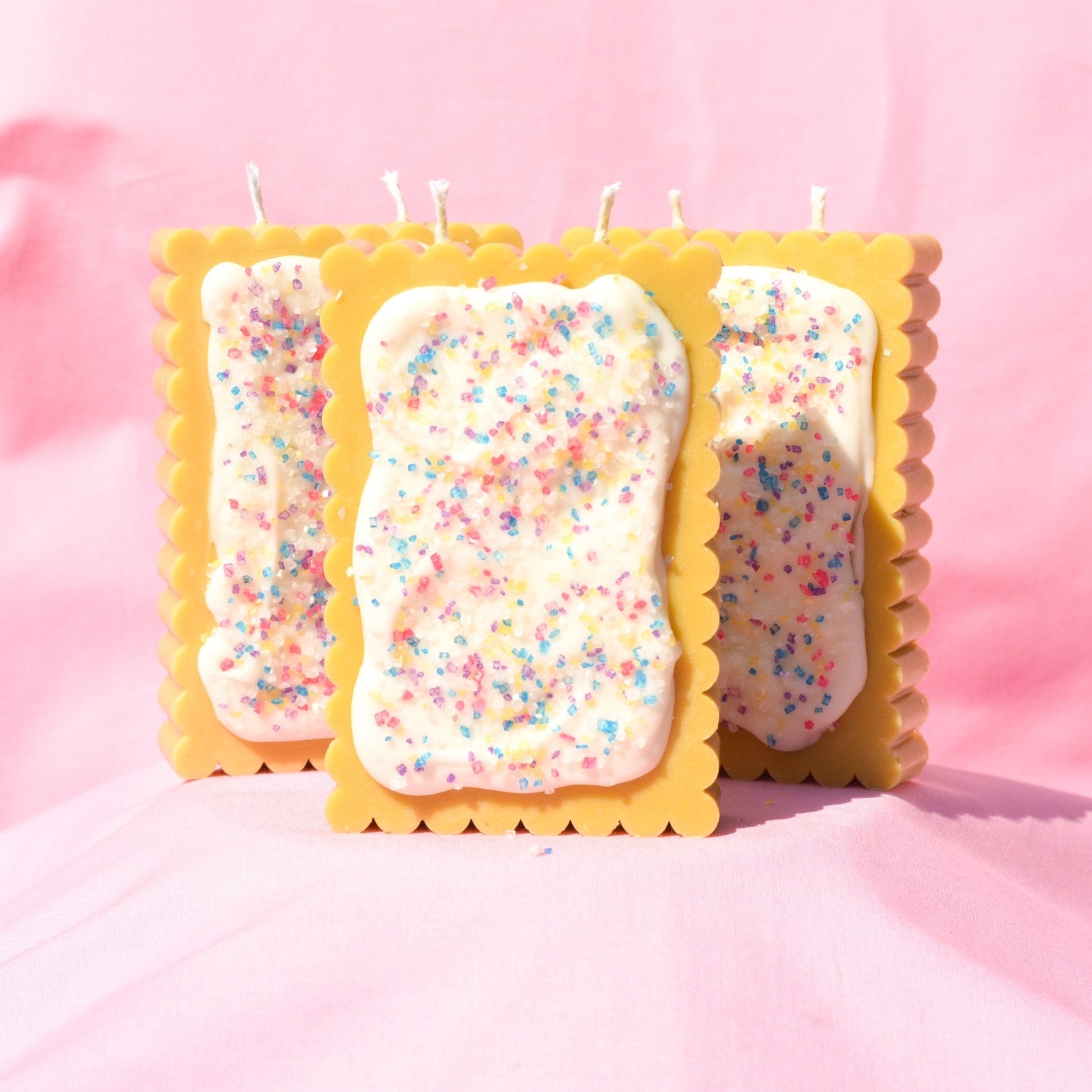 Pop tart shaped candle by Glow Worm Goods.