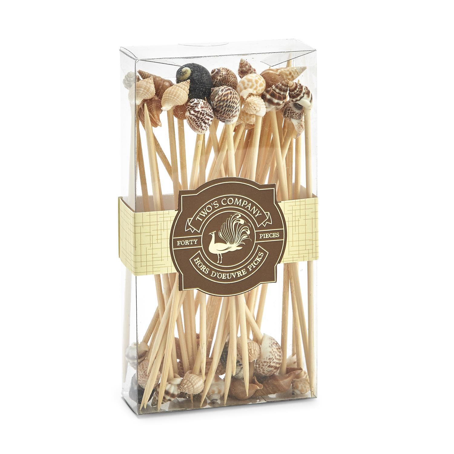 Packaged wooden skewers with decorative ends in a clear box, featuring a brand label.