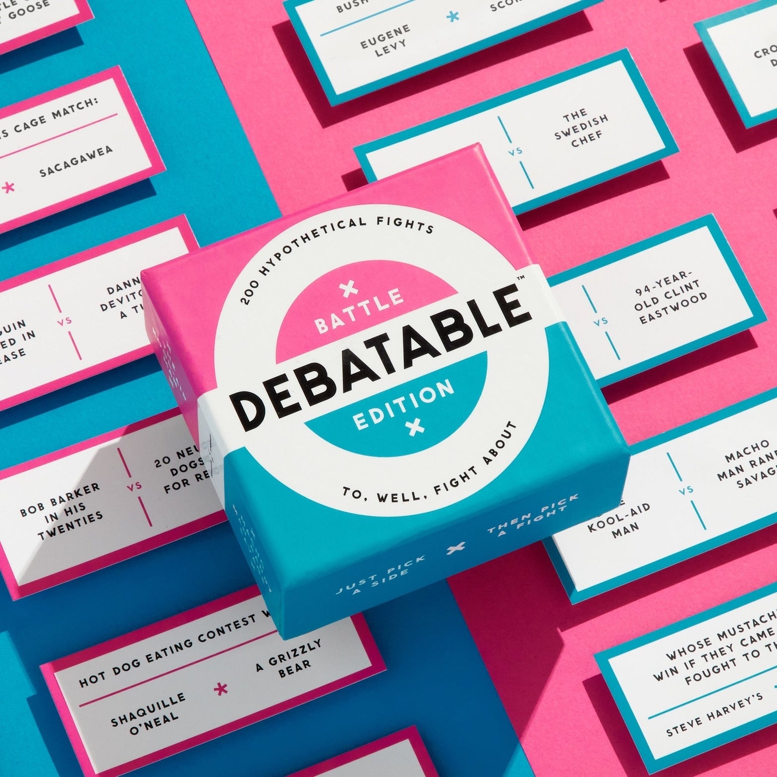 Debatable game box with cards on a pink and blue background