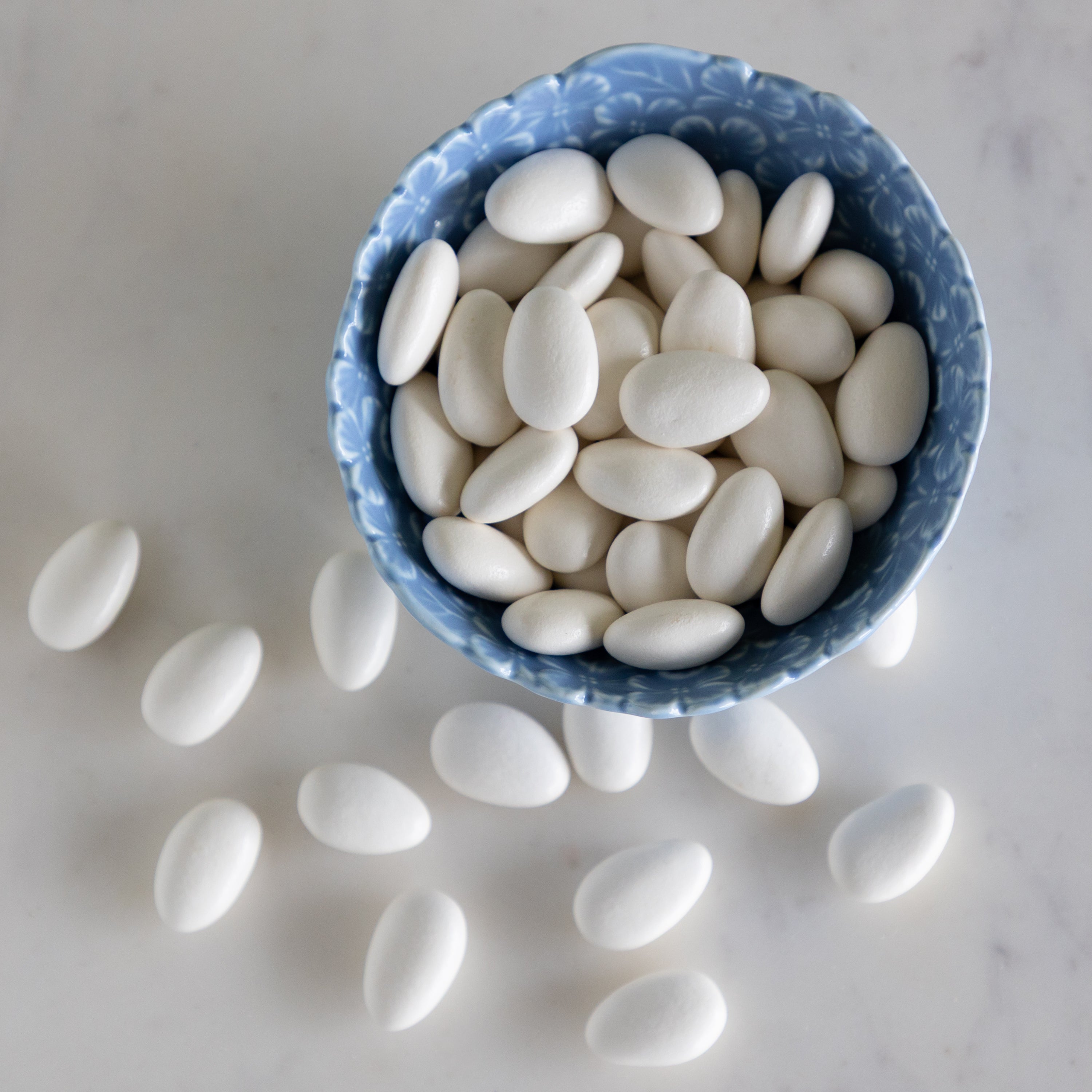 Hydrangea Tidbit Bowl filled with white chocolate covered almonds.
