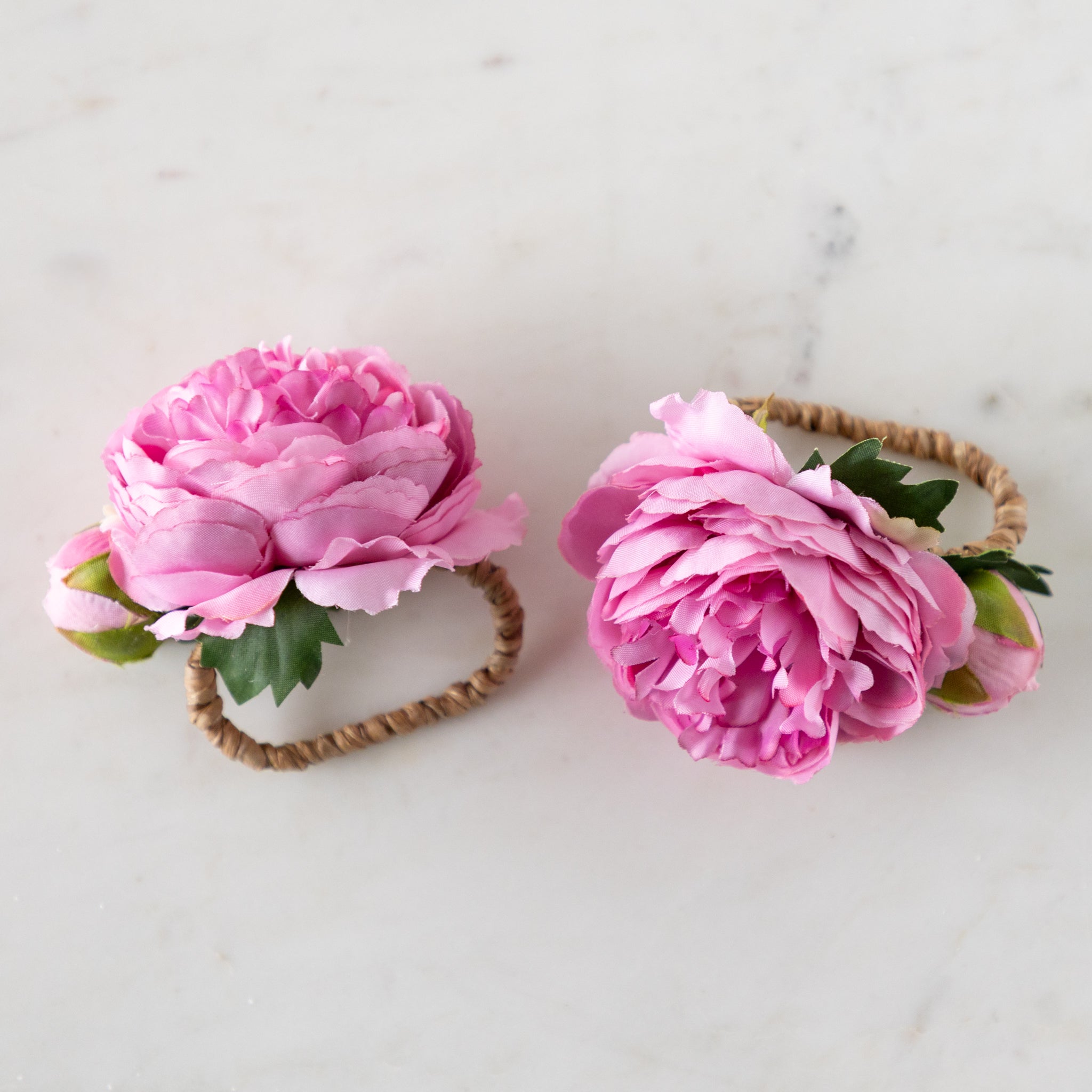 Pink Buttercup & Bud Napkin Rings with rattan holders.