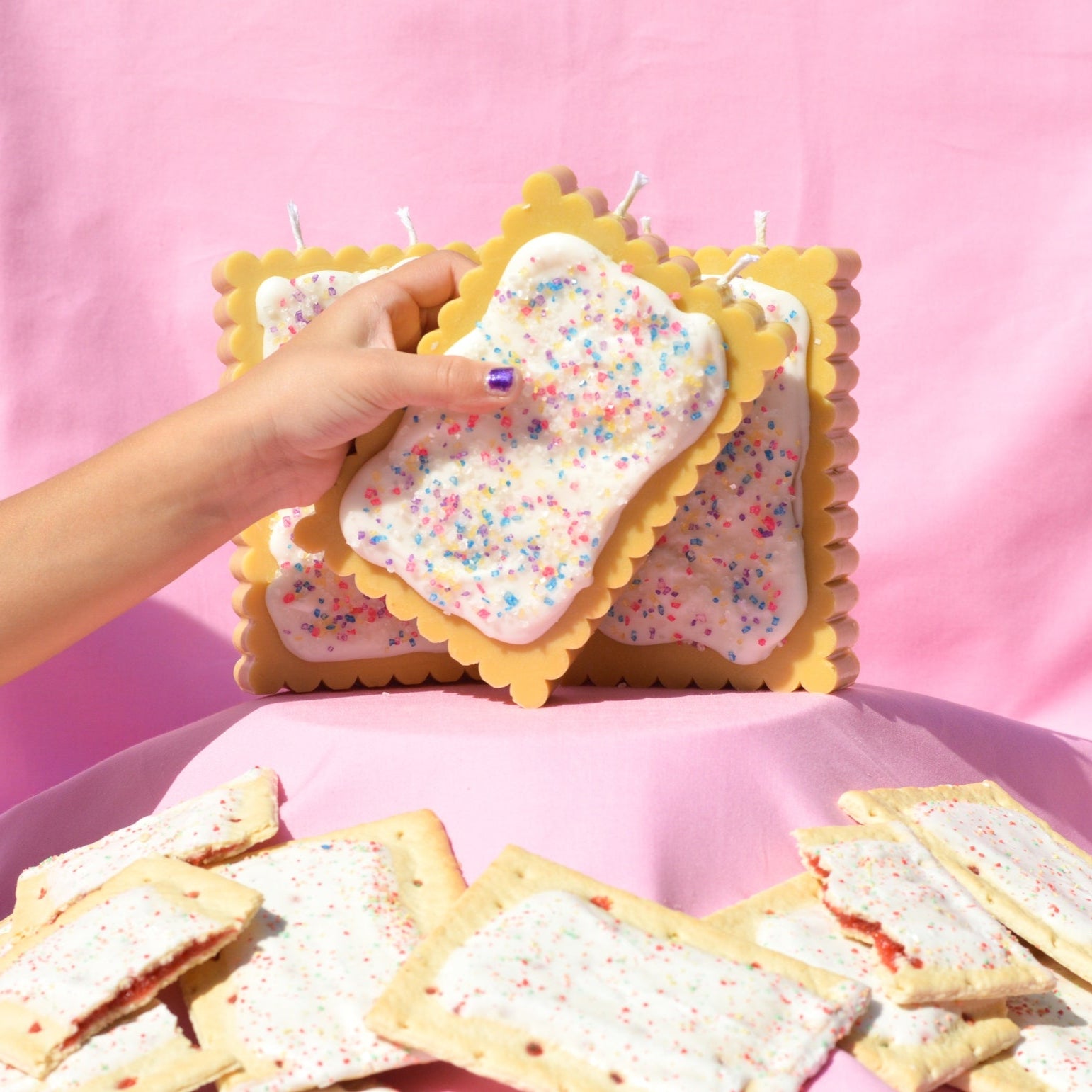 Pop tart shaped candle by Glow Worm Goods.