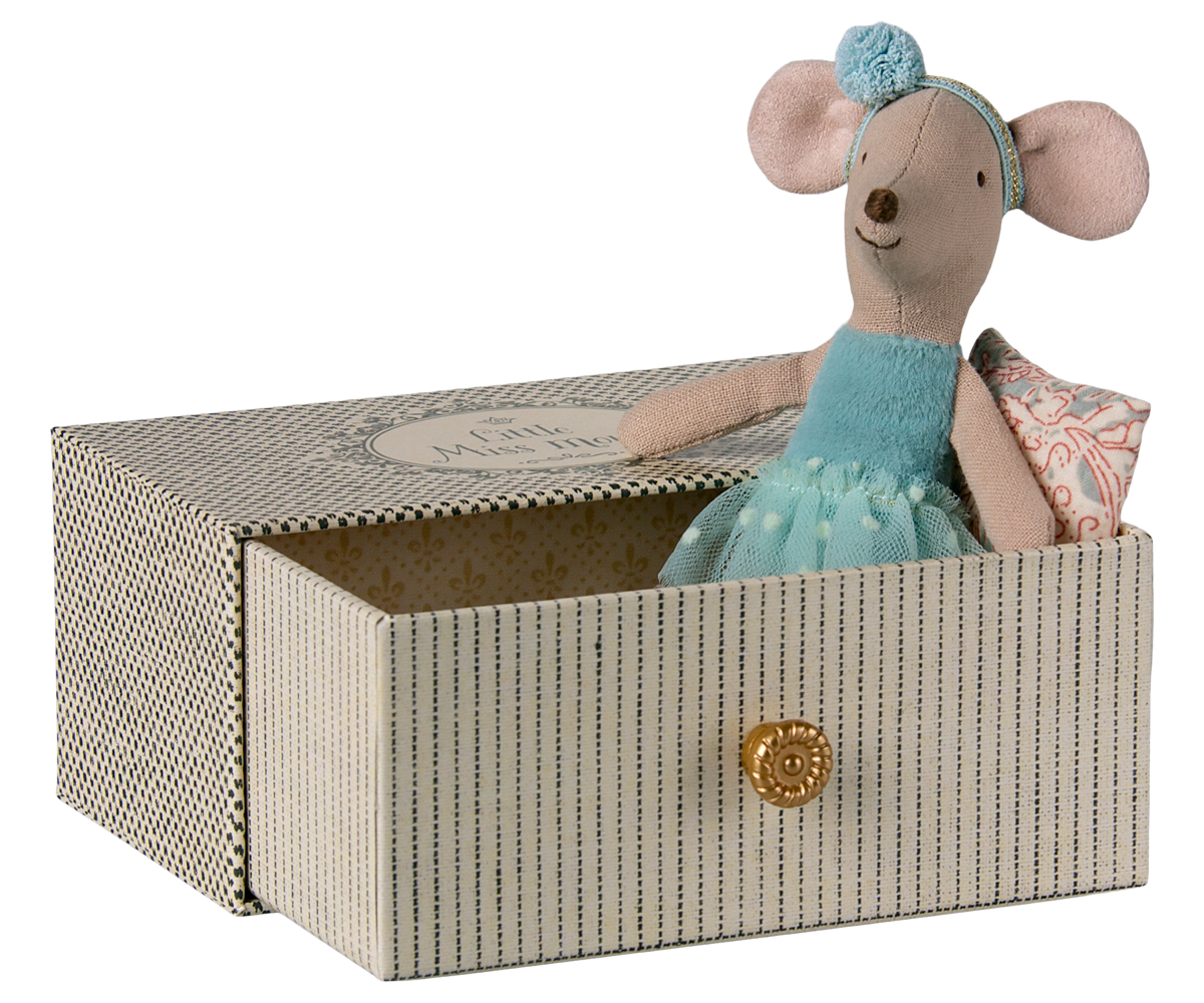 Stuffed mouse toy in a decorative box with a white background.