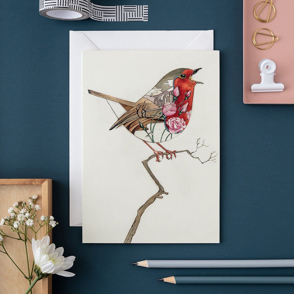 Greeting card featuring artwork by Daniel Mackie of a robin on a twig.