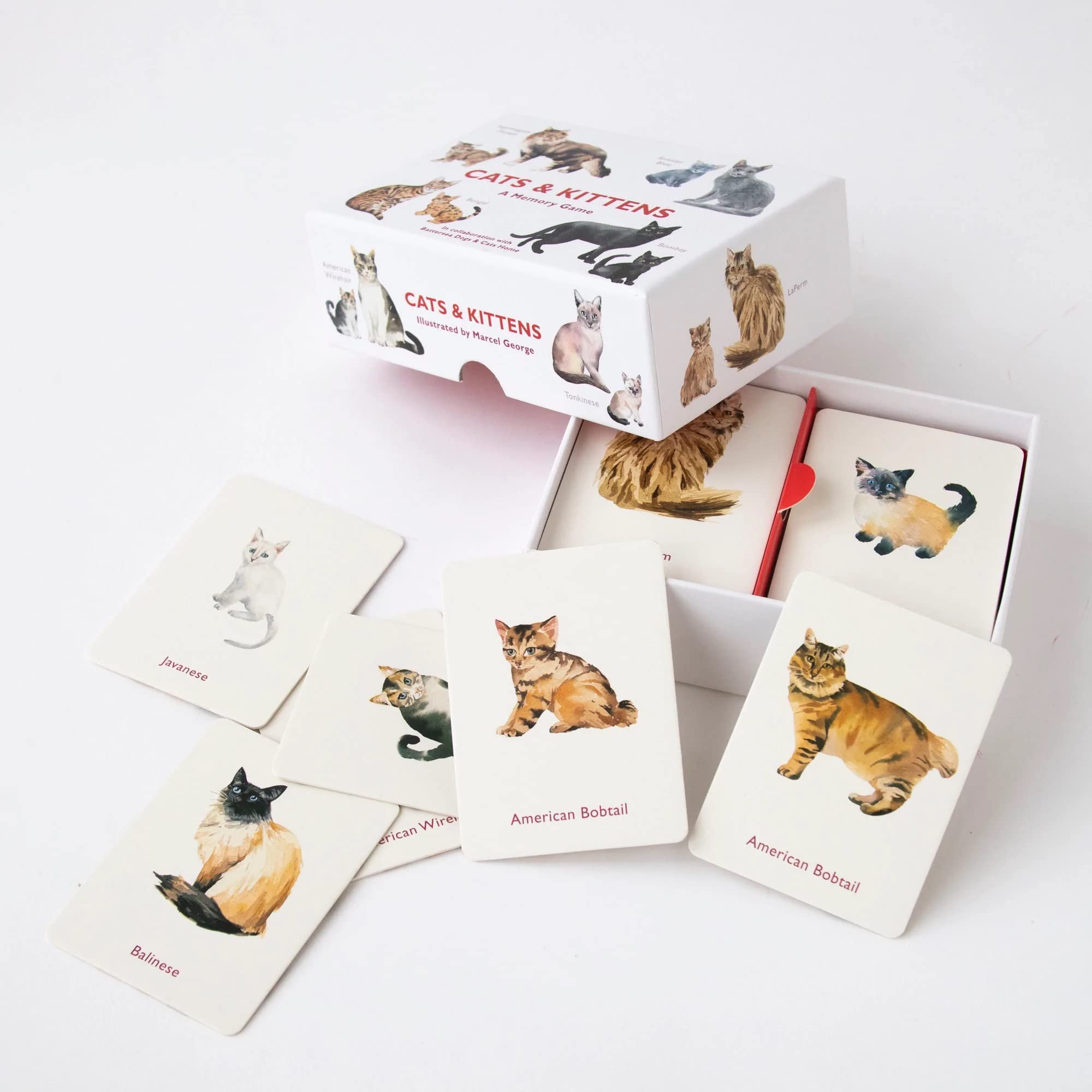 A memory game titled "Cats & Kittens: A Memory Game" featuring illustrations of various cat breeds such as Norwegian Forest, Russian Blue, Bengal, and Bombay. This educational game is designed to enhance memory skills while introducing players.
Brand Name: Chronicle Books