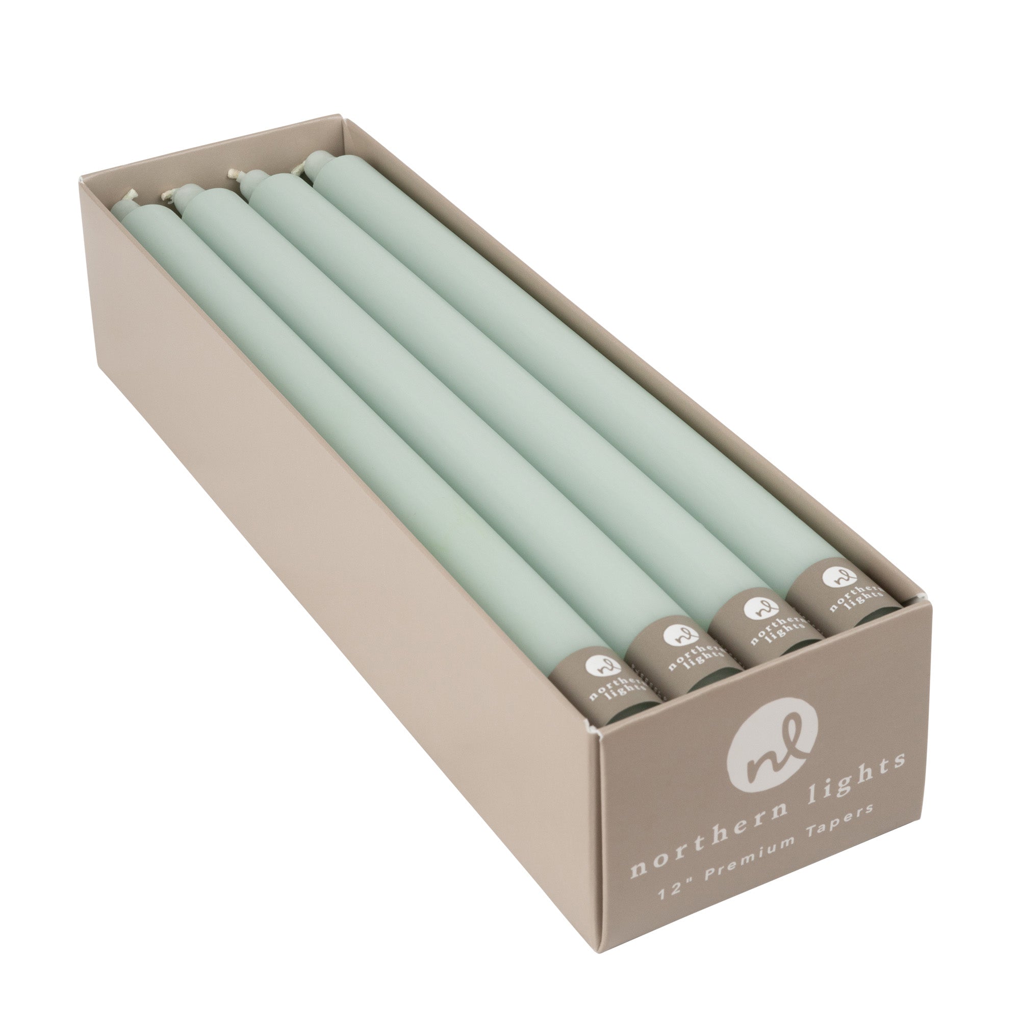 A box of pale green taper candles by Northern Lights.
