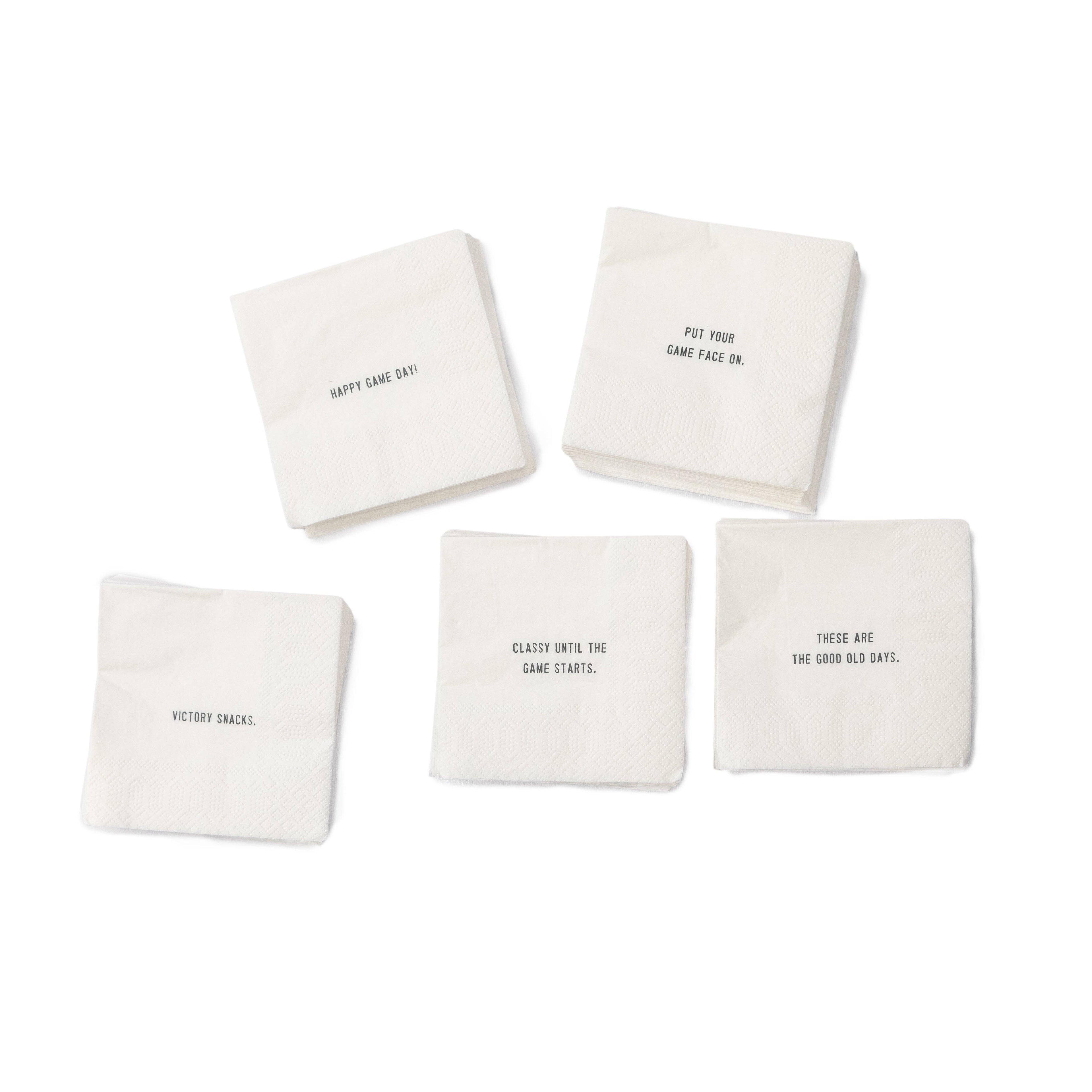 Cocktail napkins with assorted game day phrases on them.