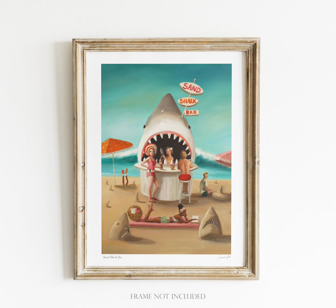 Framed illustration of a whimsical beach scene featuring a Sand Shark Small Art Print by Janet Hill, printed on heavyweight matte fine art paper using Epson Ultrachrome archival inks by a Canadian.
