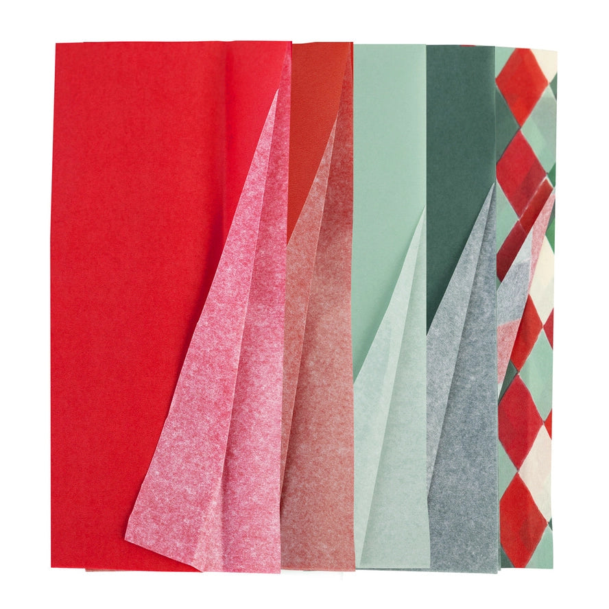 Collection of colorful tissue paper sheets on a white background
