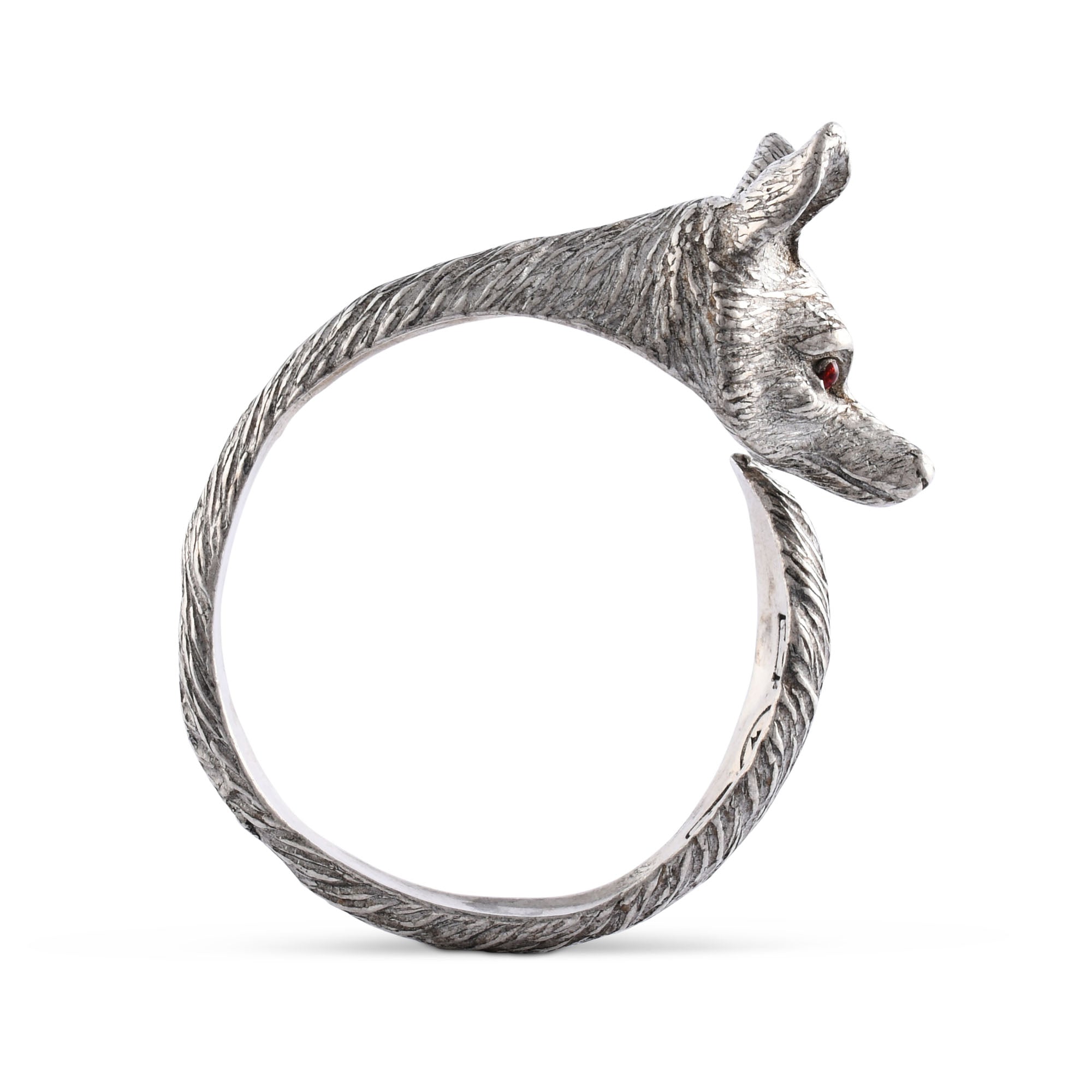 Silver napkin ring with a fox design and red eyes on a white background.