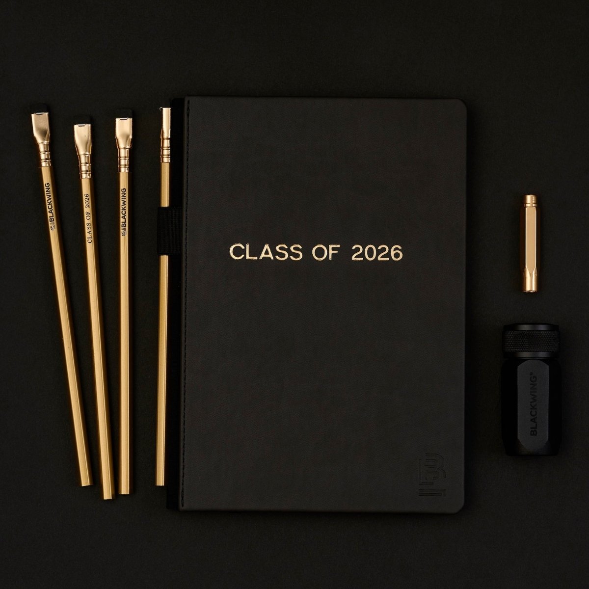 Black notebook with &