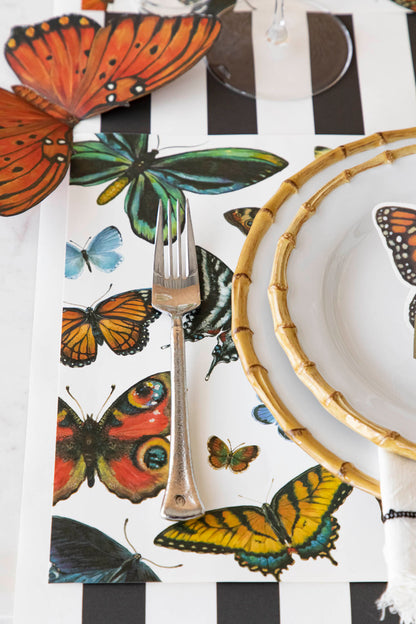 A variety of colorful butterflies displayed against a light background on Hester &amp; Cook&