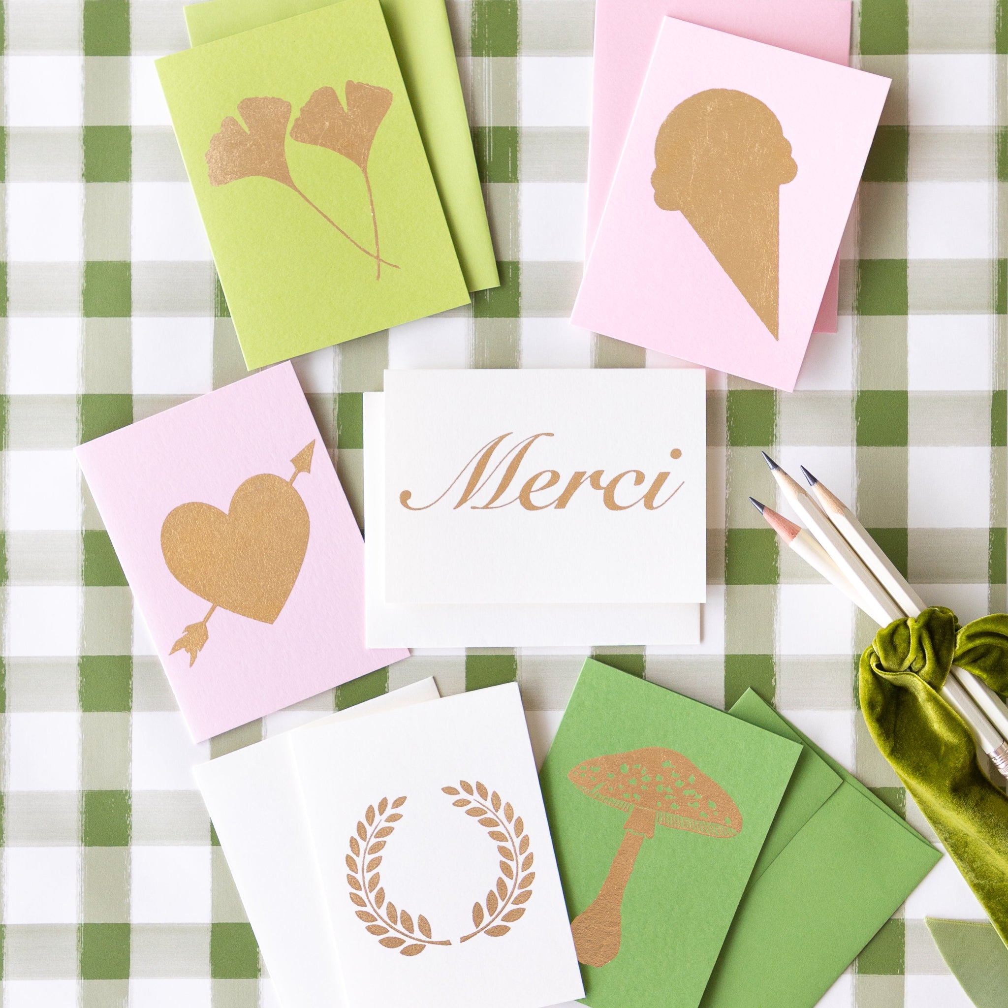 An assortment of Catherine Greenup every day cards on the Moss Painted Check Runner.