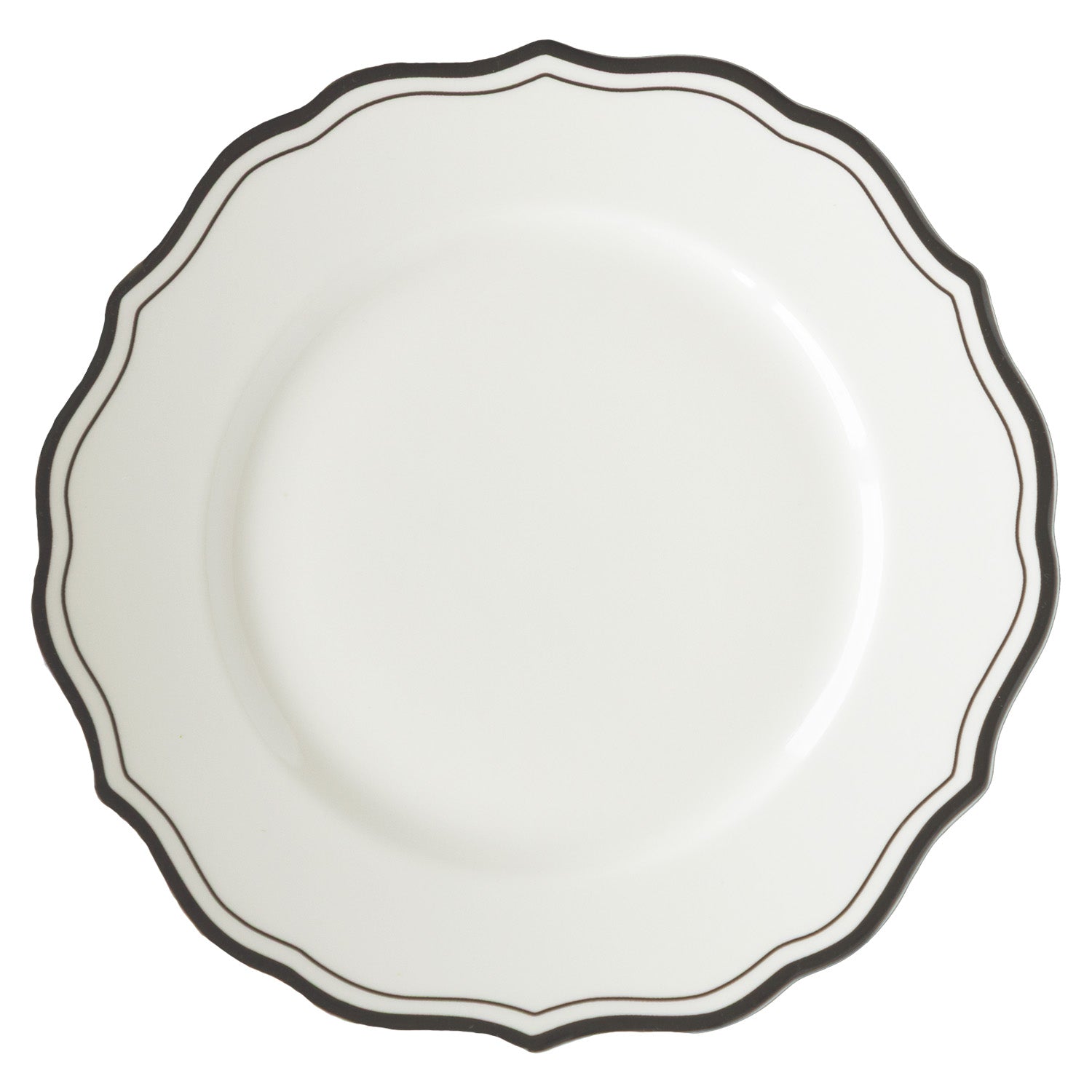 Round white dinner plate with a black rim and scalloped edge on a white background.