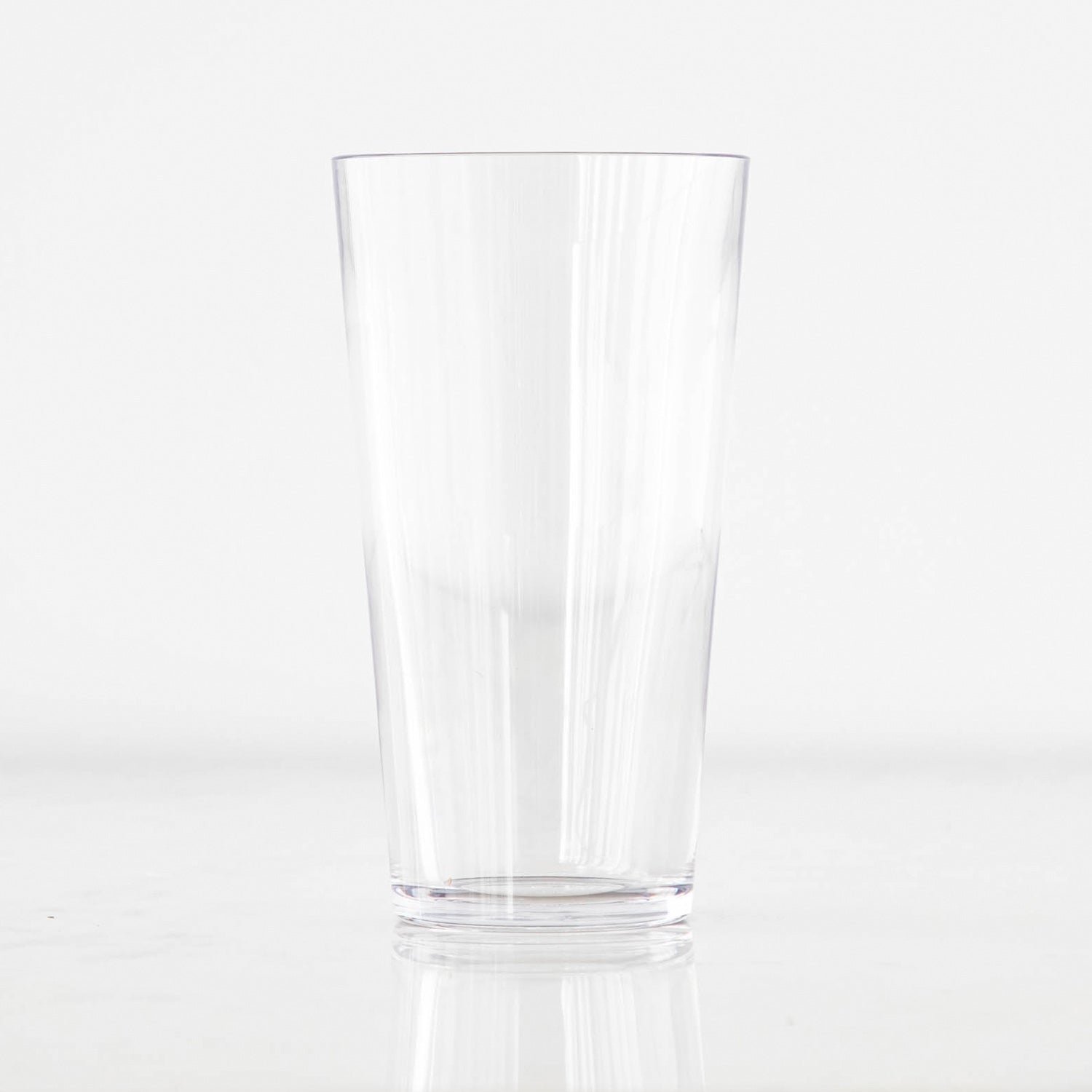 A clear tumbler on a white background.