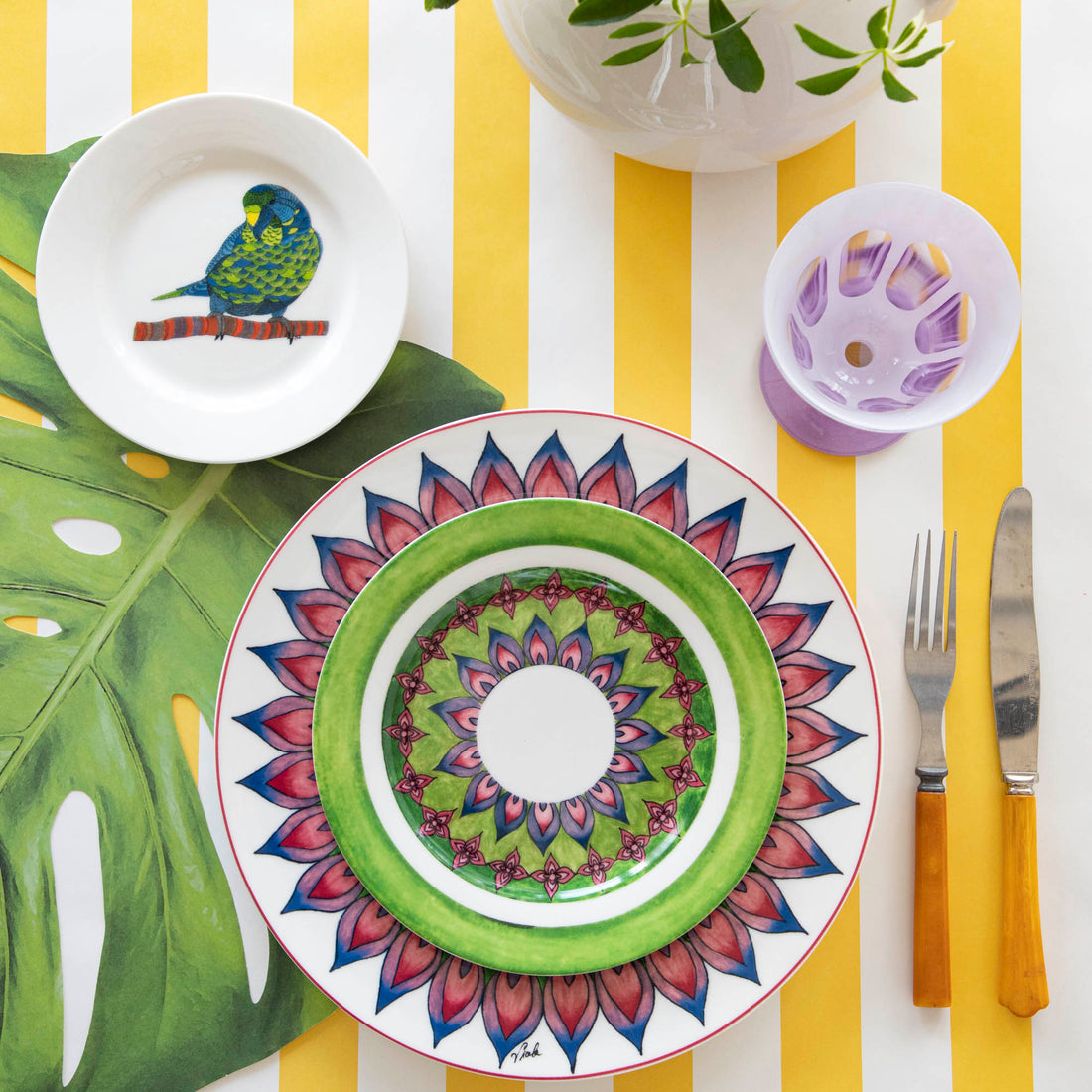 A plate with a bird on it from the Park Hill Calypso Dinnerware collection.