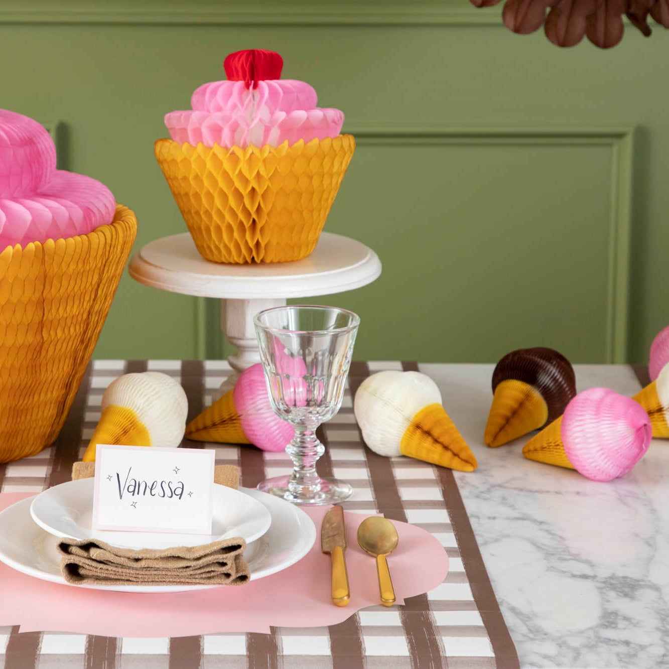 Honeycomb Small Ice Cream Cones Set of 3, styled on a birthday themed table setting for one.