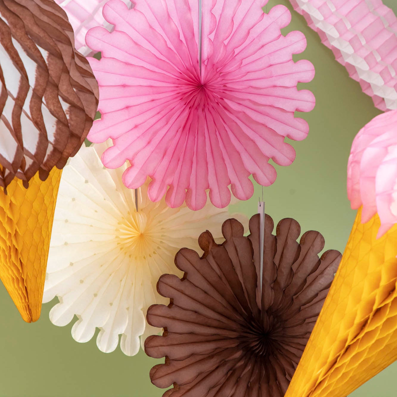 Honeycomb Large Ice Cream Cones hanging from the ceiling.