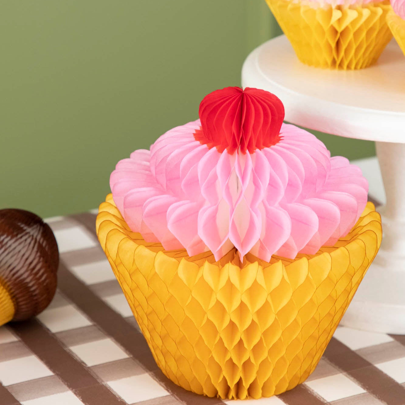 Large Honeycomb Cupcake on a table.