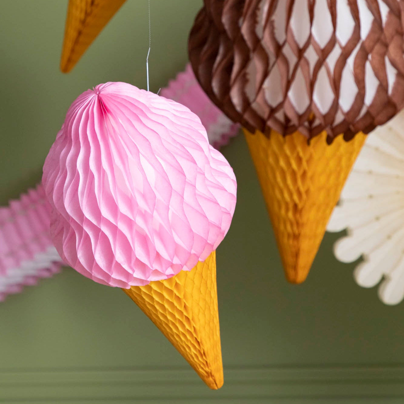 Honeycomb Medium Ice Cream Cone hanging from the ceiling.