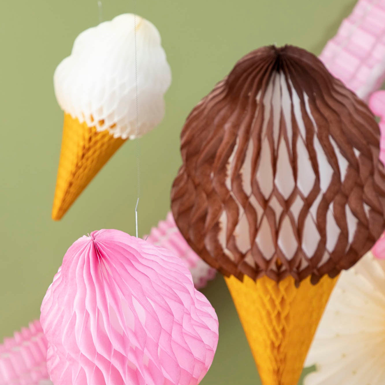 Honeycomb Medium Ice Cream Cones hanging from the ceiling.