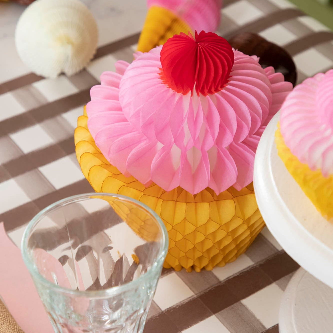 Medium Honeycomb Cupcake on the Brown Painted Check Runner.