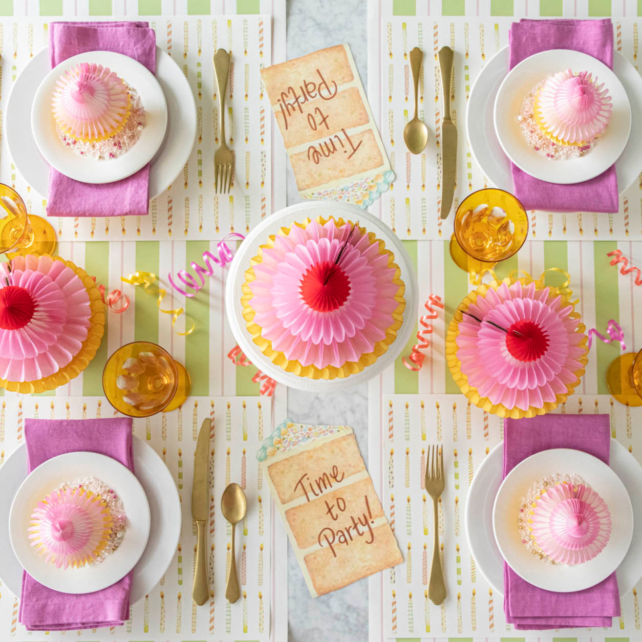 Honeycomb Cupcakes styled on a fun, birthday themed table setting for four.