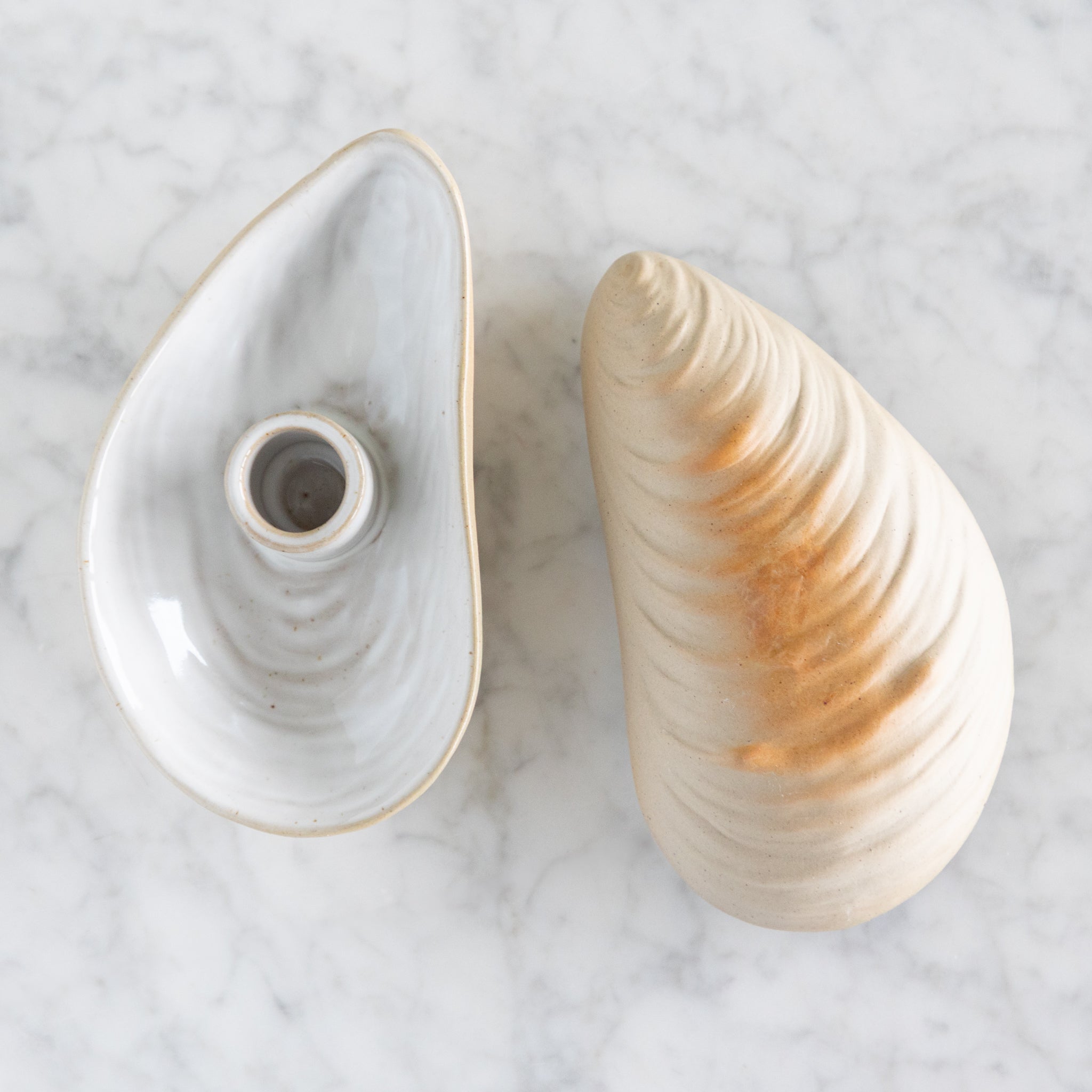 Oyster shell shaped candle holder.