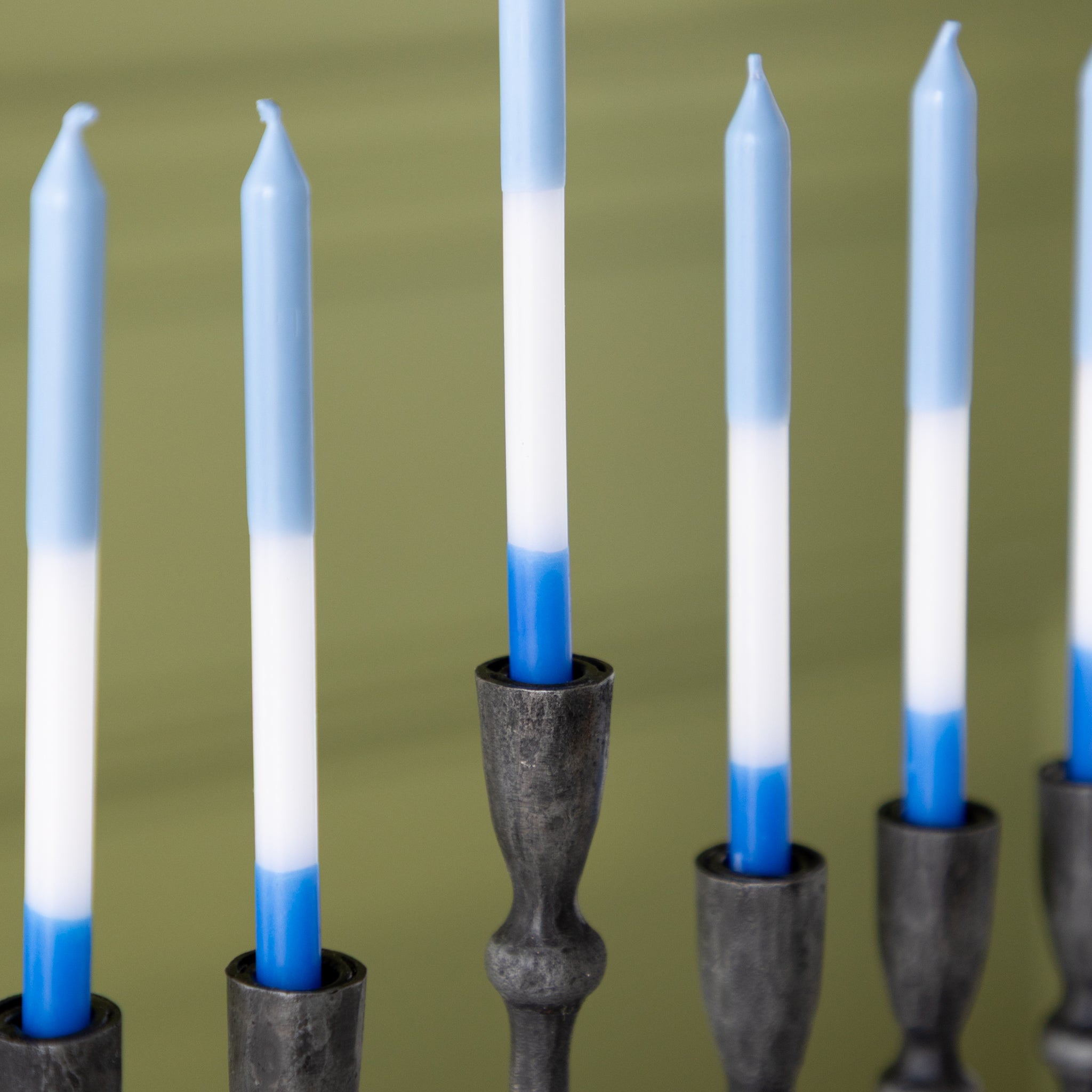 Liora Menorah with blue and white menorah candles.