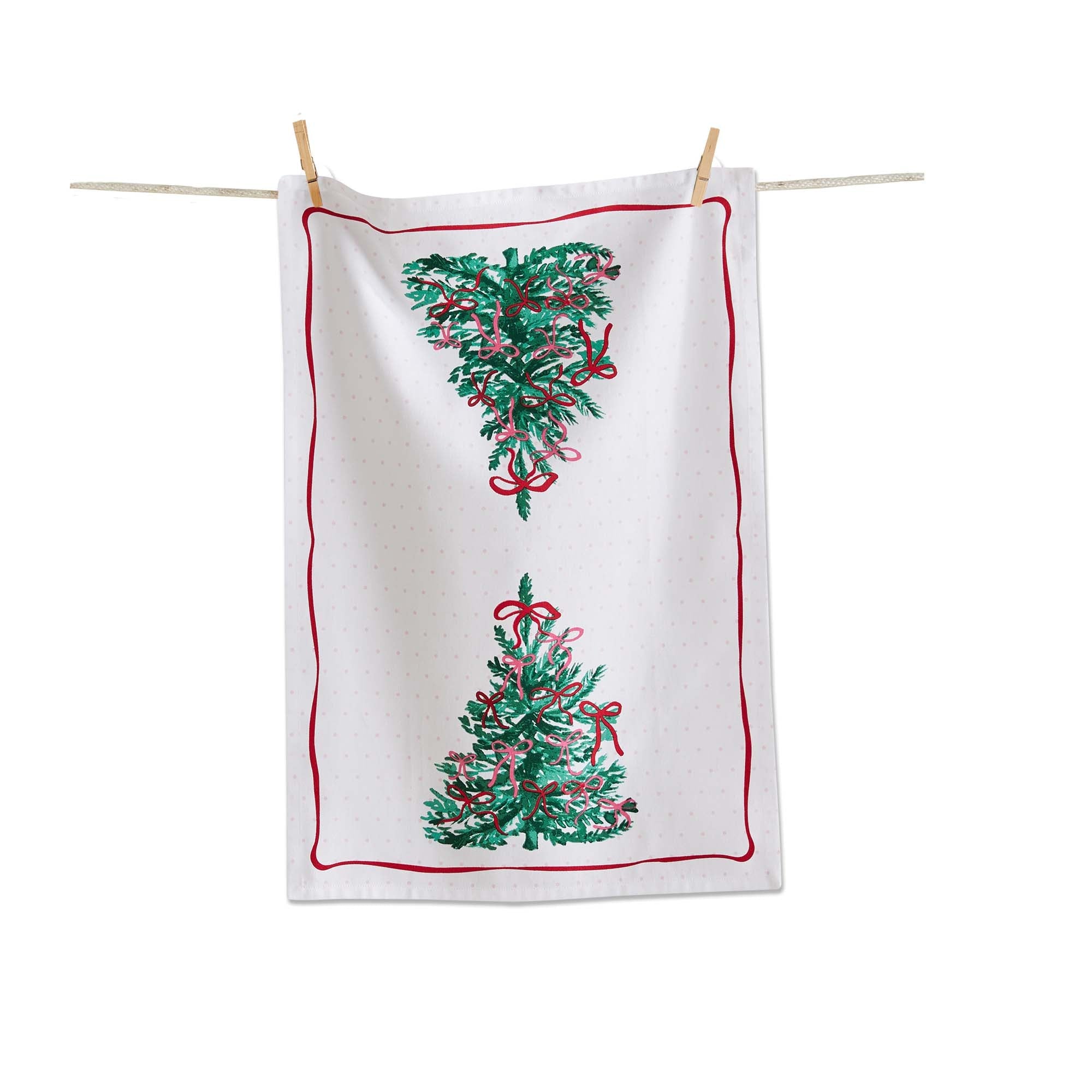 A festive and cheerful dishtowel adorned with pink bows and Christmas trees.