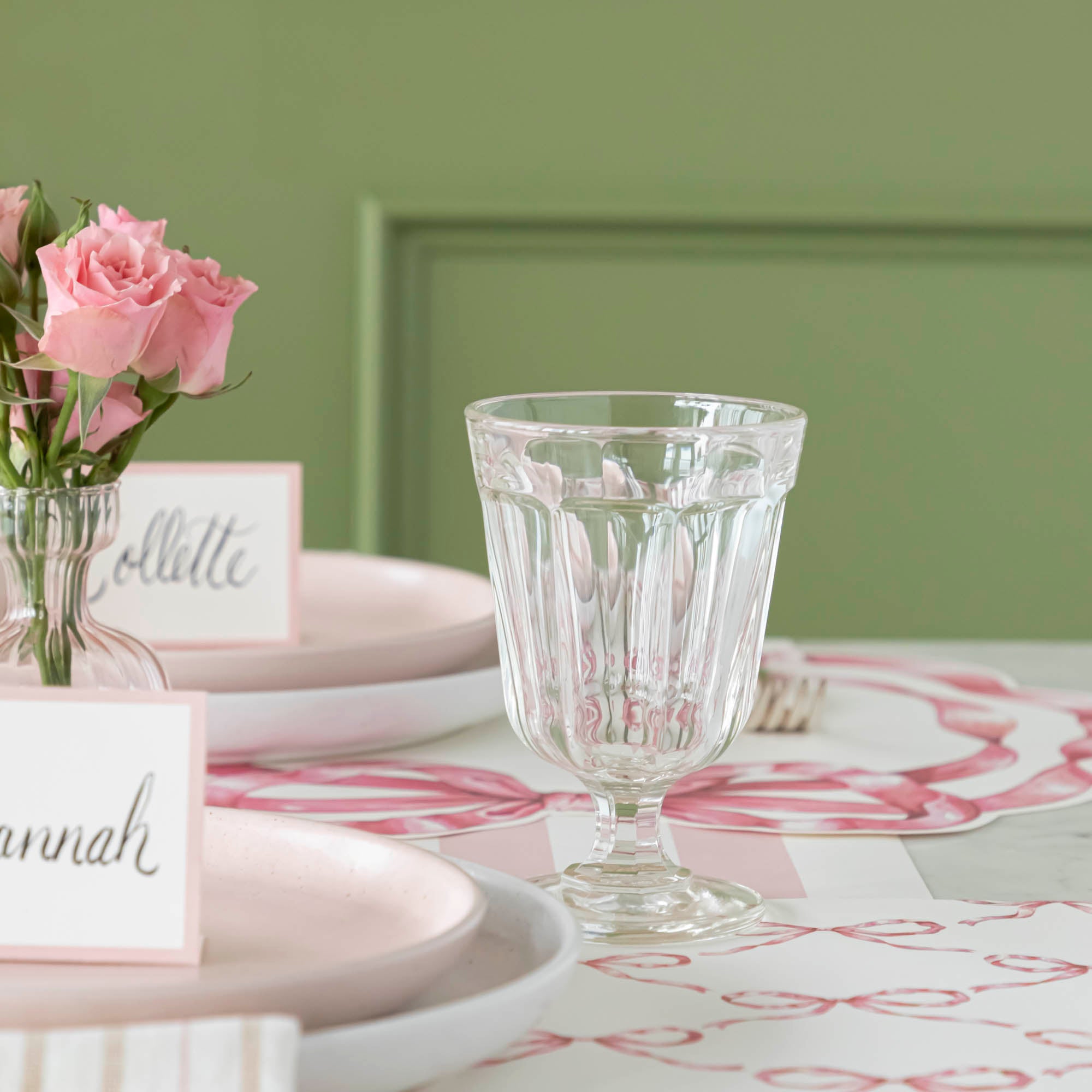 Two Casafina Living Gomos Water Glasses on a wooden table.