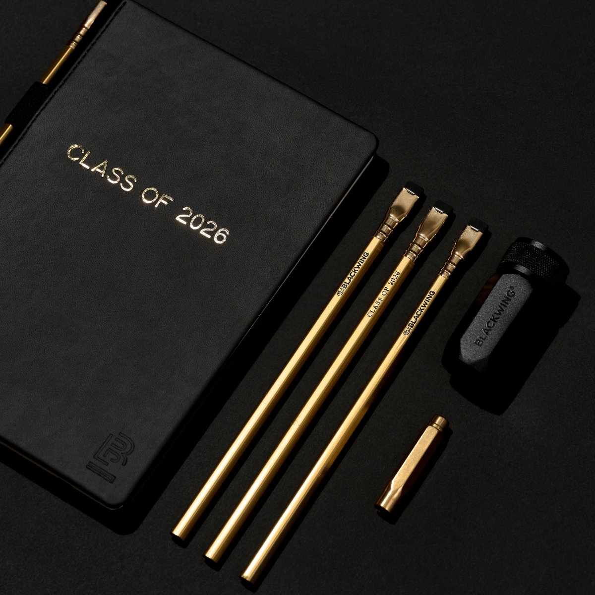 Black notebook with &