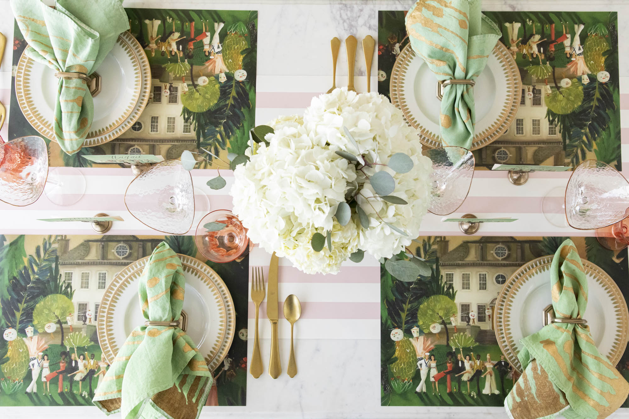A gorgeous table setting for four featuring a High Kick Placemat under each plate.