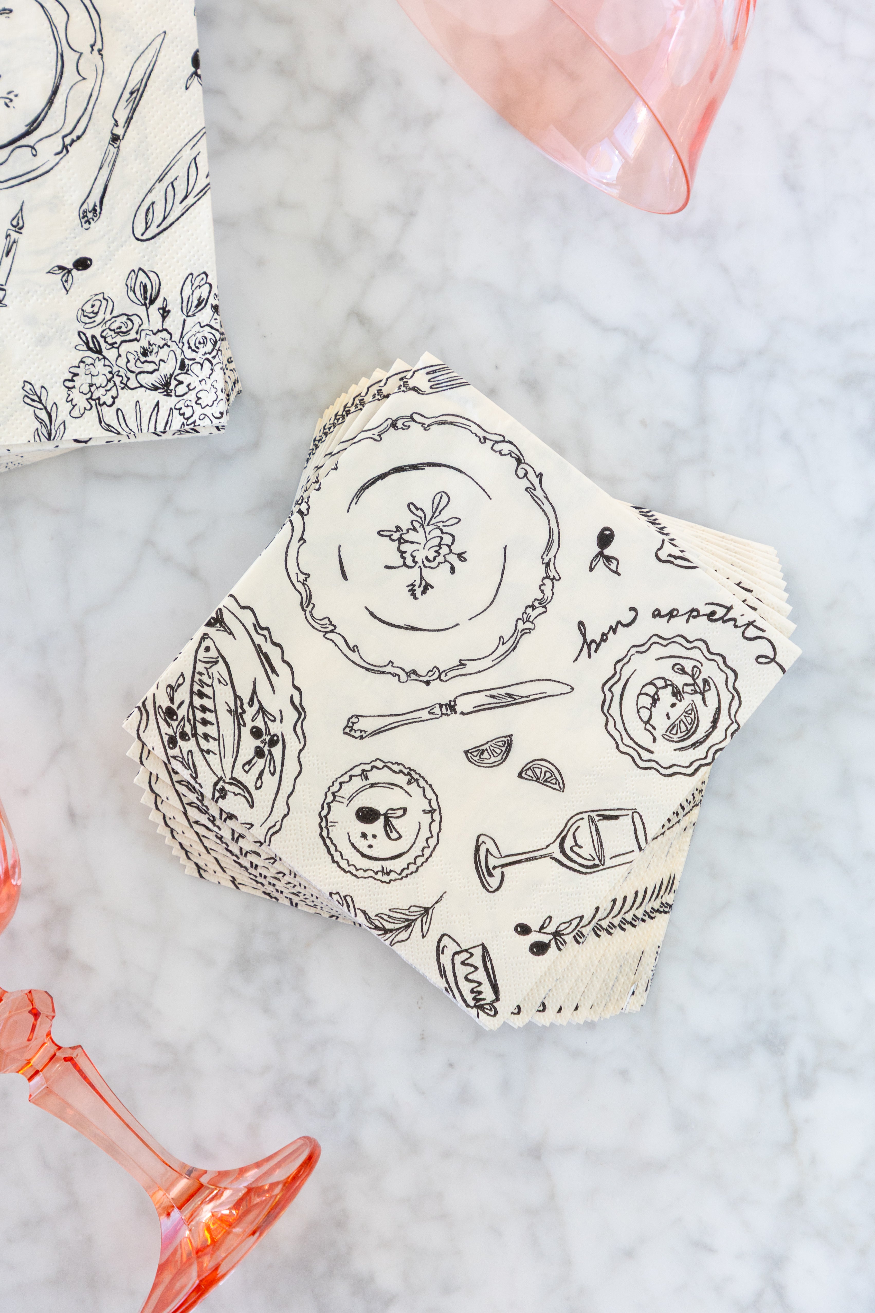 Dinner Party Cocktail Napkins on a marble table.