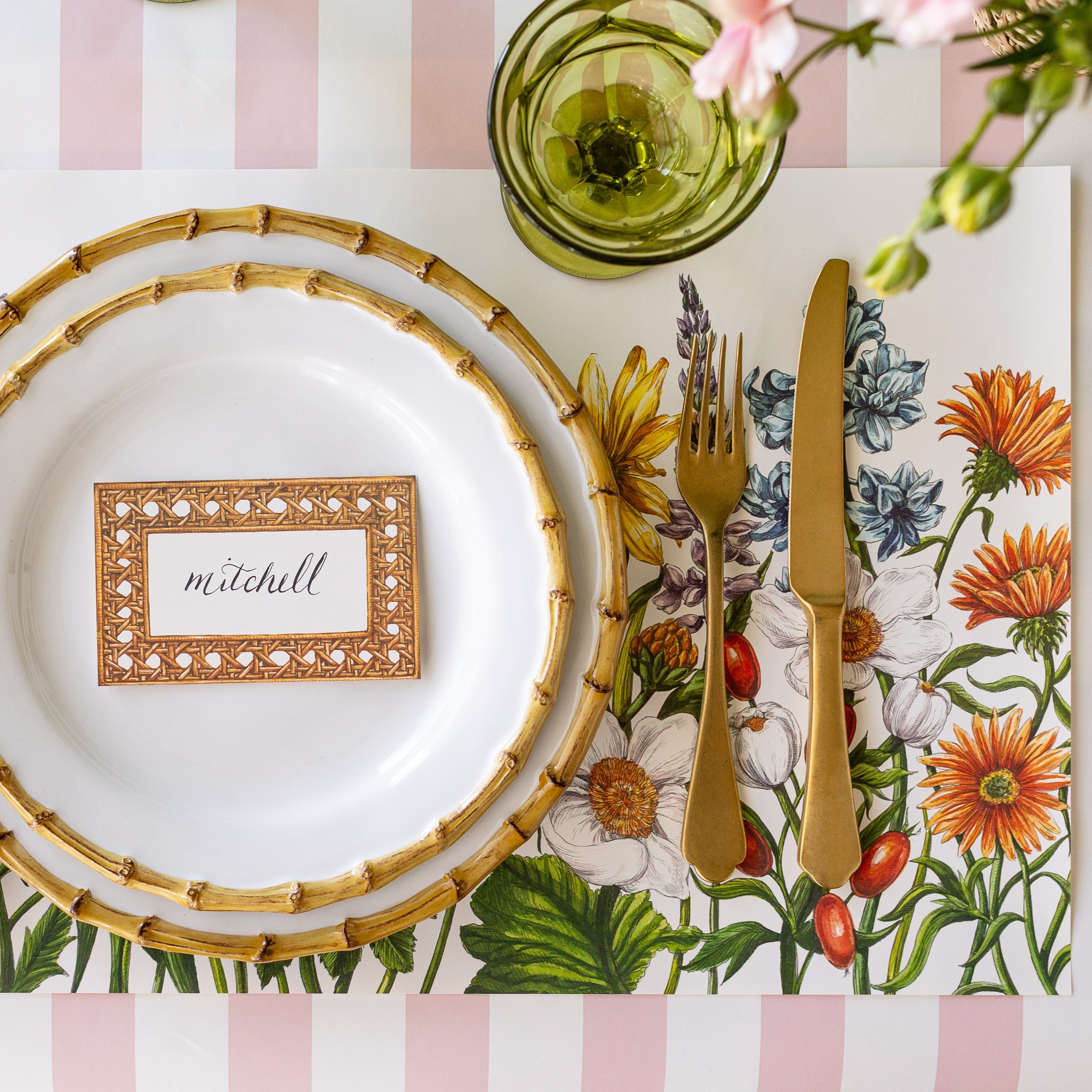 Wildflower Meadow Placemat under an elegant place setting with the Rattan Weave Place Card resting on dinner plates.