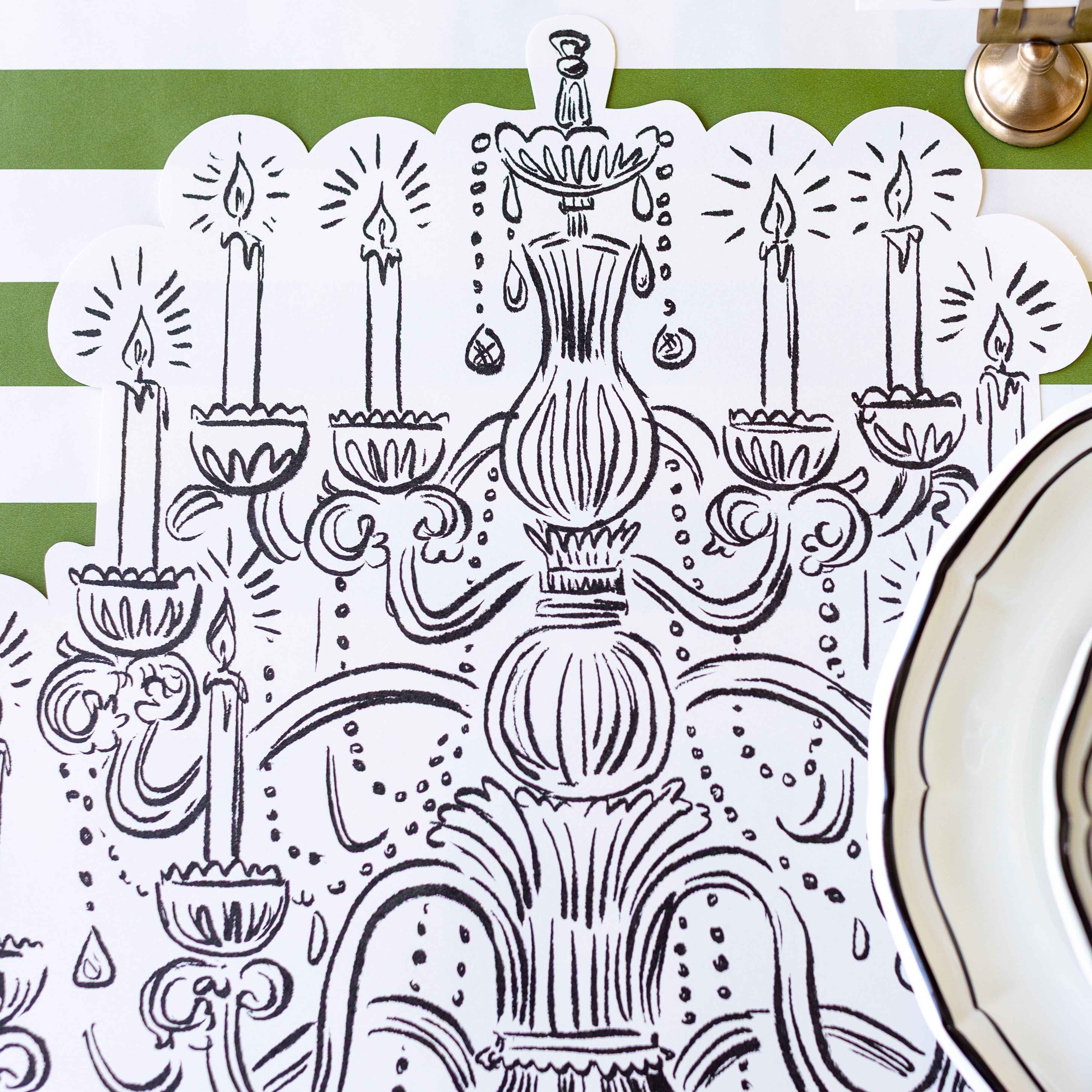 The Die-cut Chandelier Placemat on the Dark Green Classic Stripe Runner.
