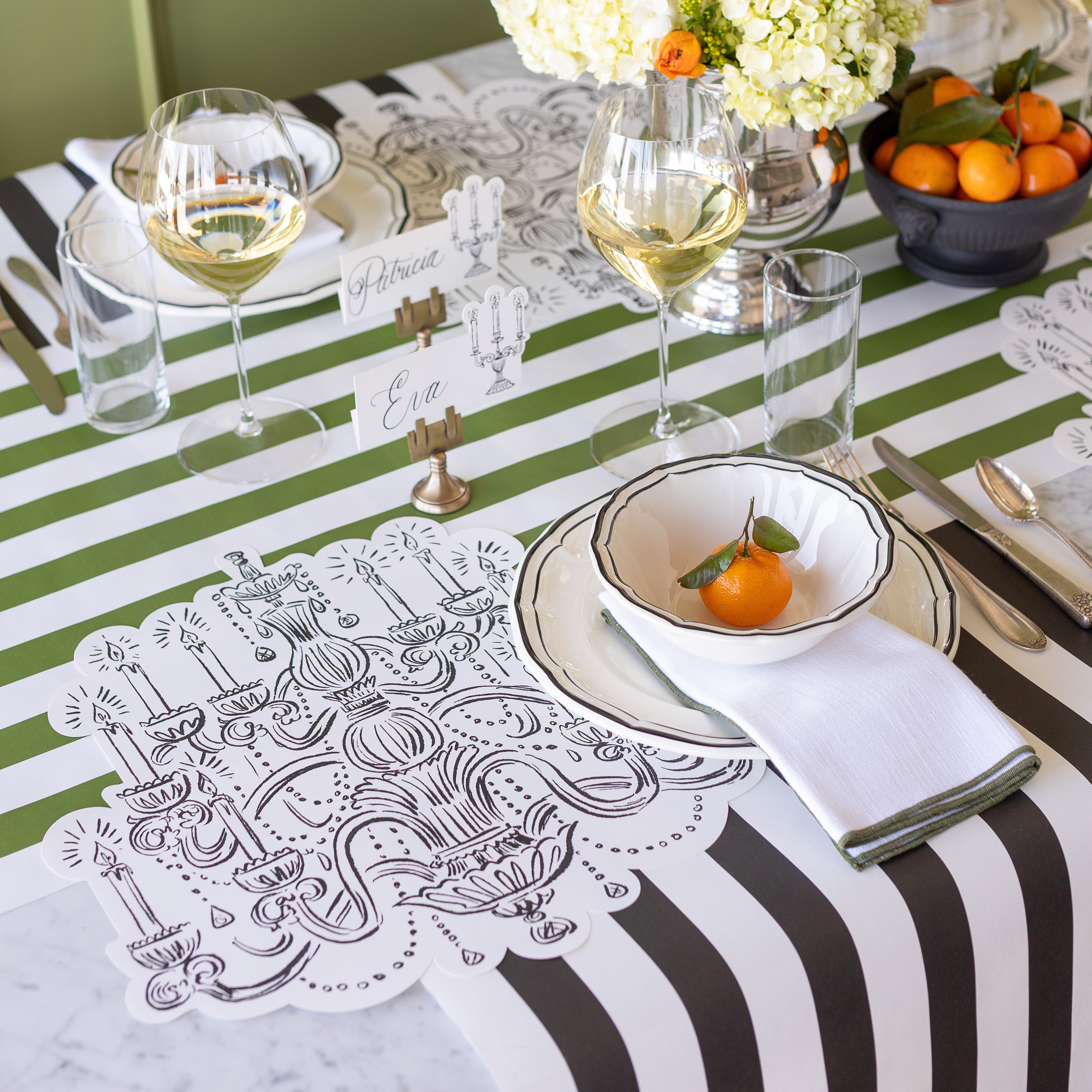 An elegant table setting featuring the Die-cut Chandelier Placemat on the Black Classic Stripe Runner.