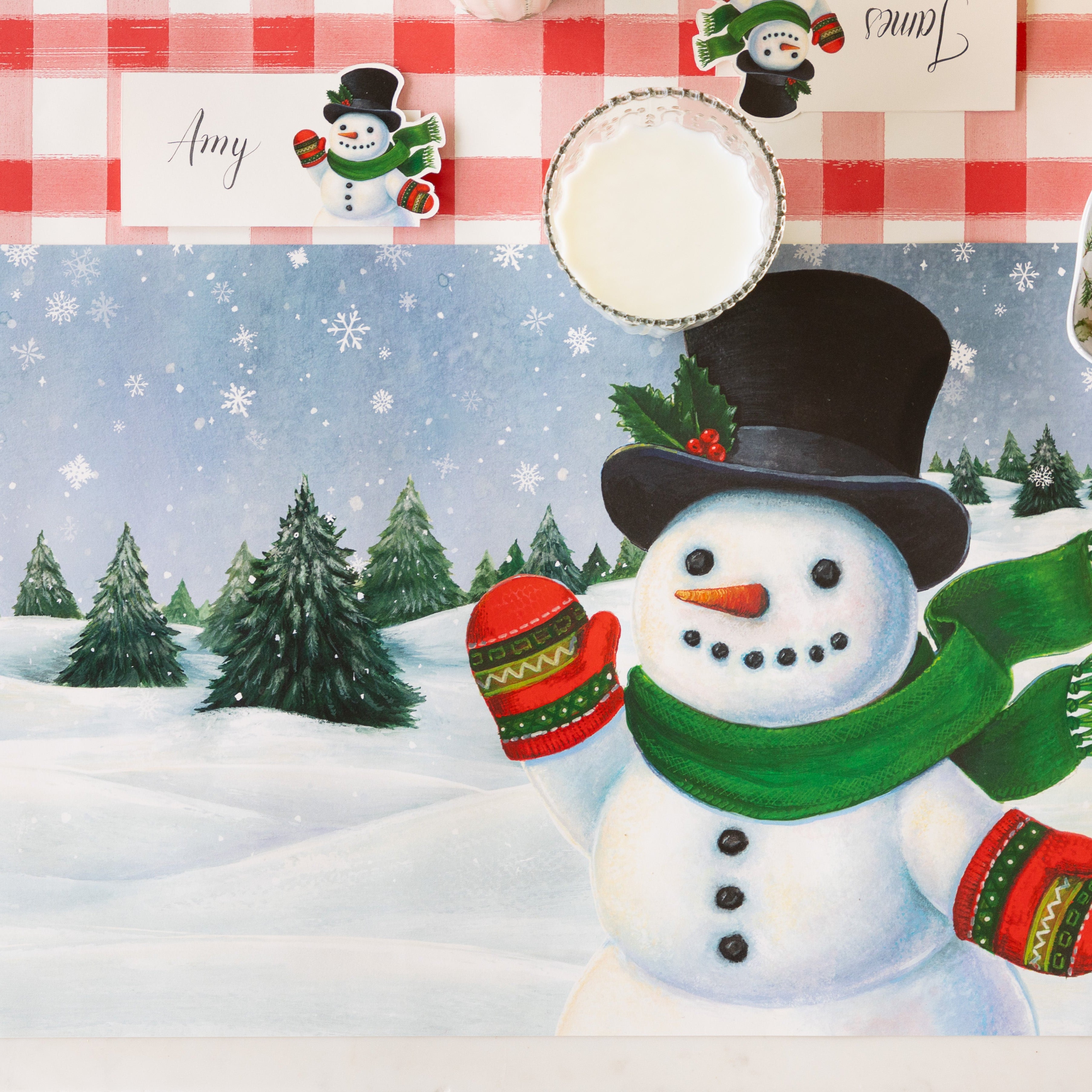 The Jolly Snowman Placemat with the Jolly Snowman Place Card above it, on the Red Painted Check Runner.