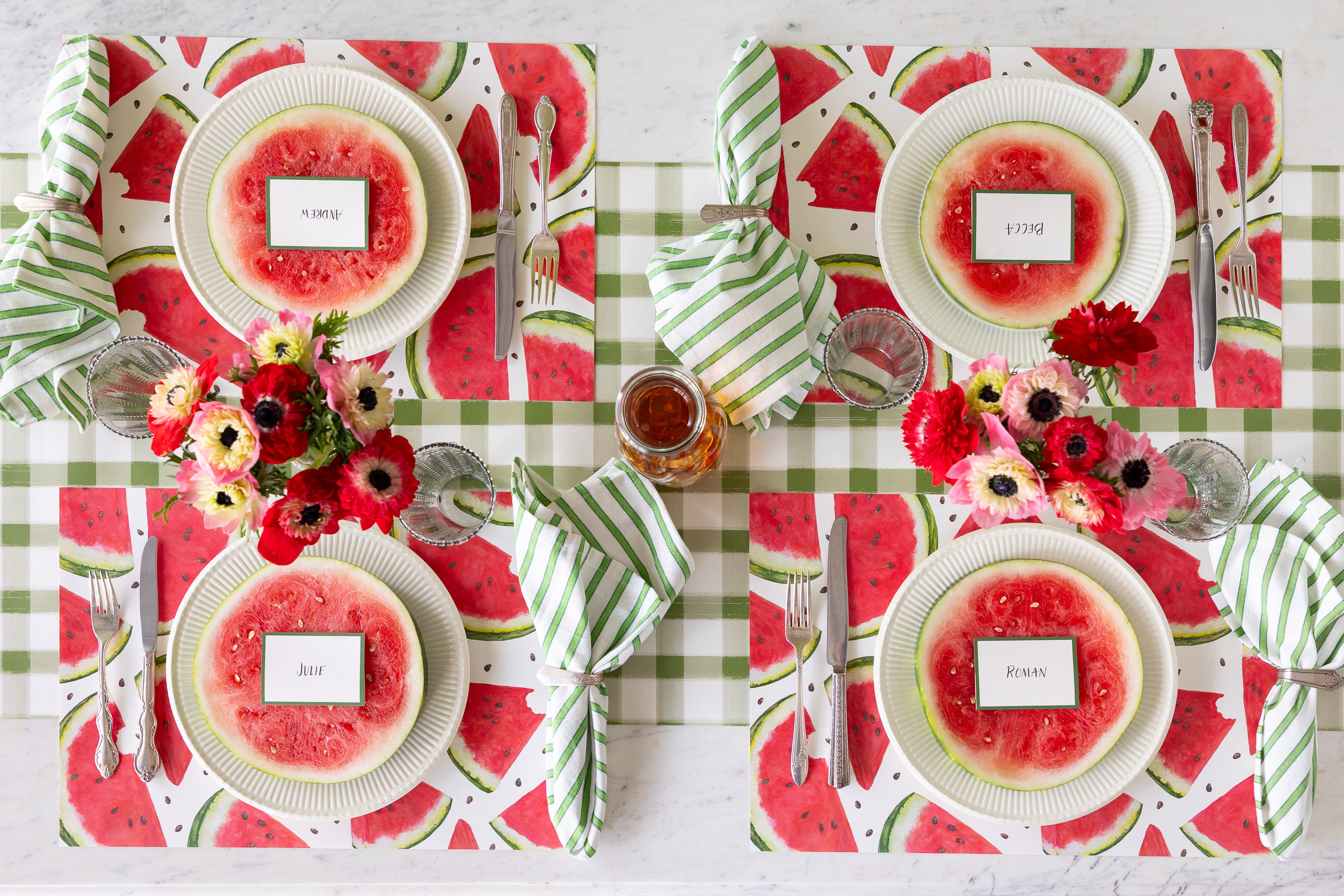 Table setting with the Watermelon Picnic Placemats, white plates, Dark Green Frame Place Cards and vintage flatware on the Moss Painted Check Runner.