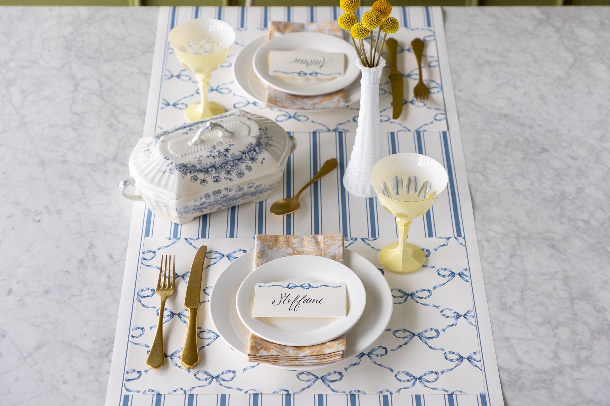 Elegant table setting with the Heirloom Blue Bow Lattice Placemat on the Cornflower Blue Linen Stripe Runner.
