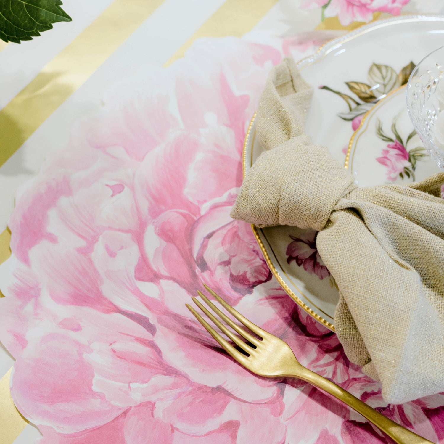 Close-up of the Die-cut Peony Placemat under an elegant floral place setting.