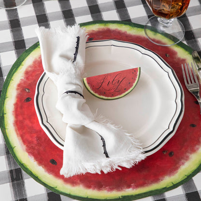 The Die-cut Watermelon Placemat under an elegant place setting.